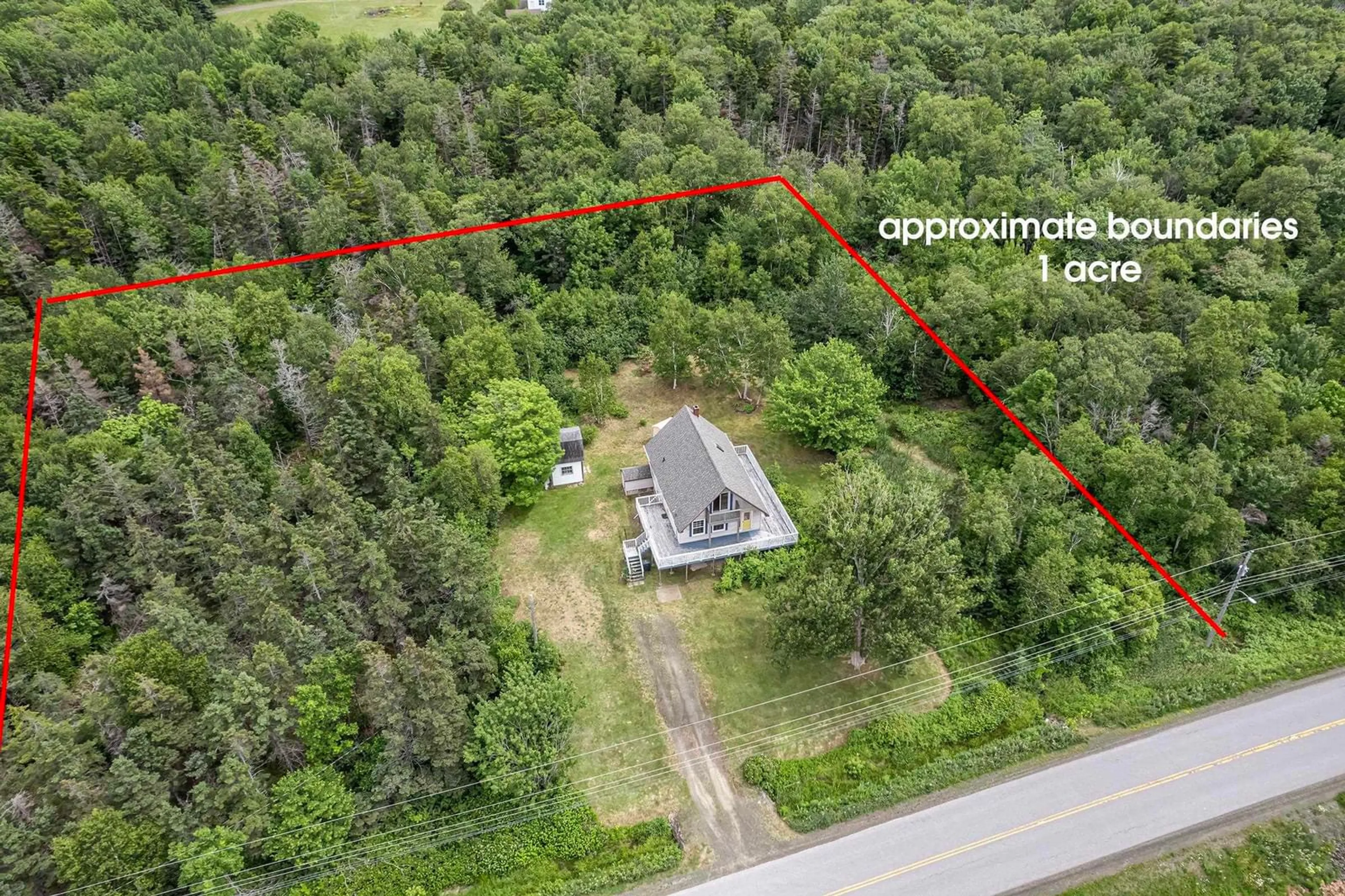 A pic from outside/outdoor area/front of a property/back of a property/a pic from drone, unknown for 6092 Shore Rd, Youngs Cove Nova Scotia B0S 1L0