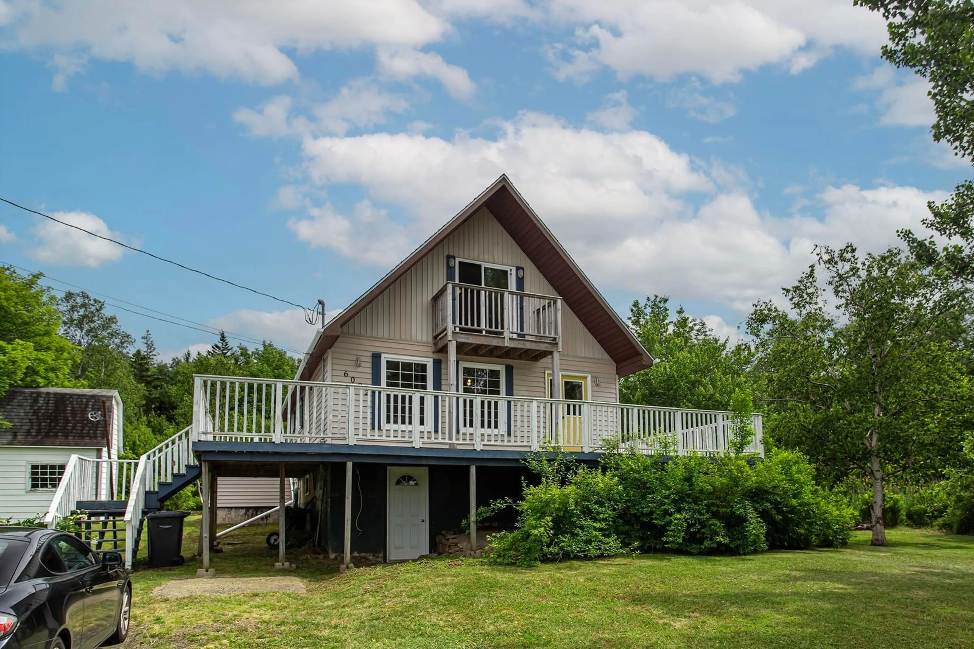 A pic from outside/outdoor area/front of a property/back of a property/a pic from drone, water/lake/river/ocean view for 6092 Shore Rd, Youngs Cove Nova Scotia B0S 1L0