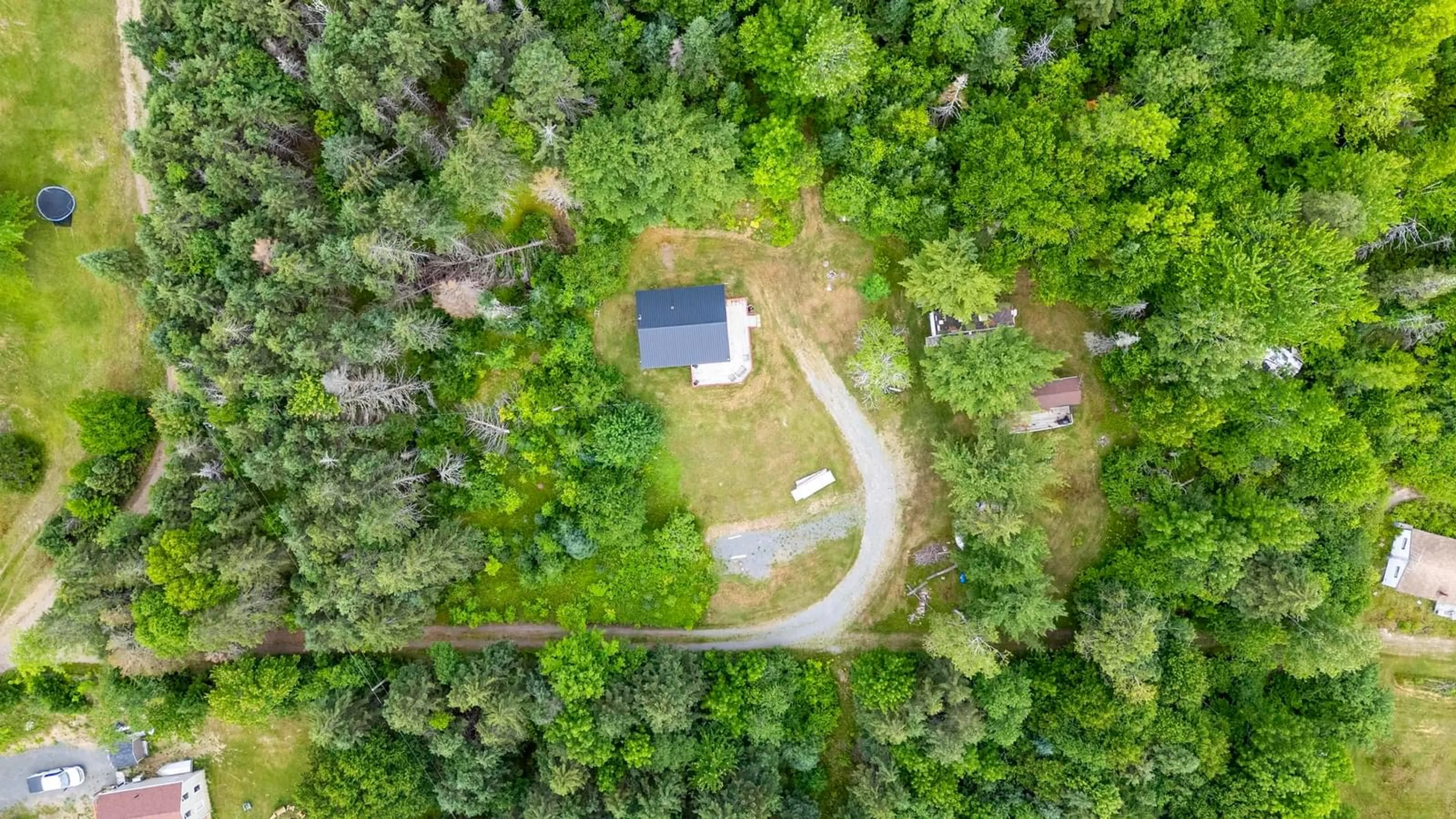 A pic from outside/outdoor area/front of a property/back of a property/a pic from drone, forest/trees view for 33 Shine Dr, Lochaber Nova Scotia B2G 2L3