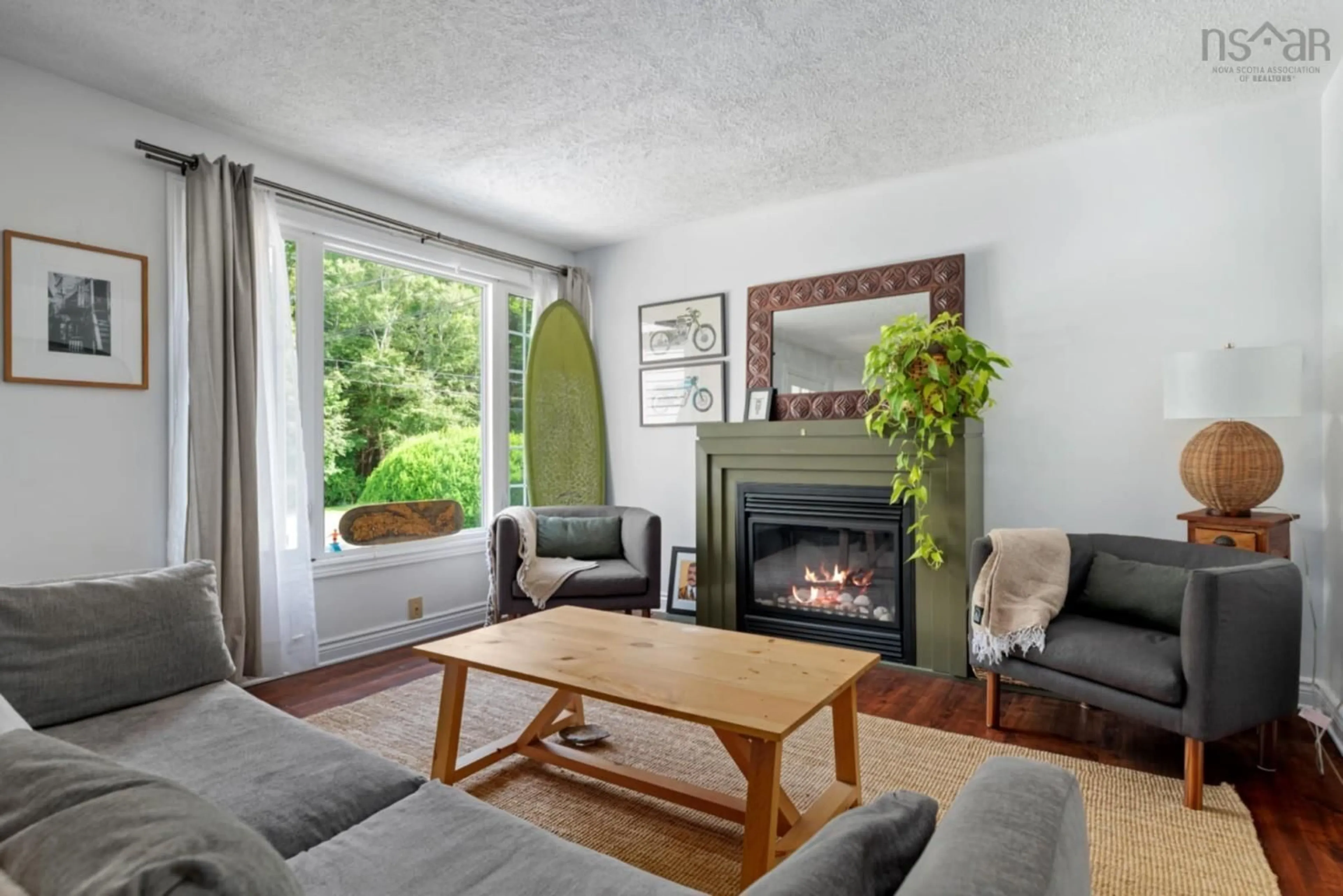 Living room with furniture, wood/laminate floor for 23 Birchwood Terr, Crichton Park Nova Scotia B3A 3W2