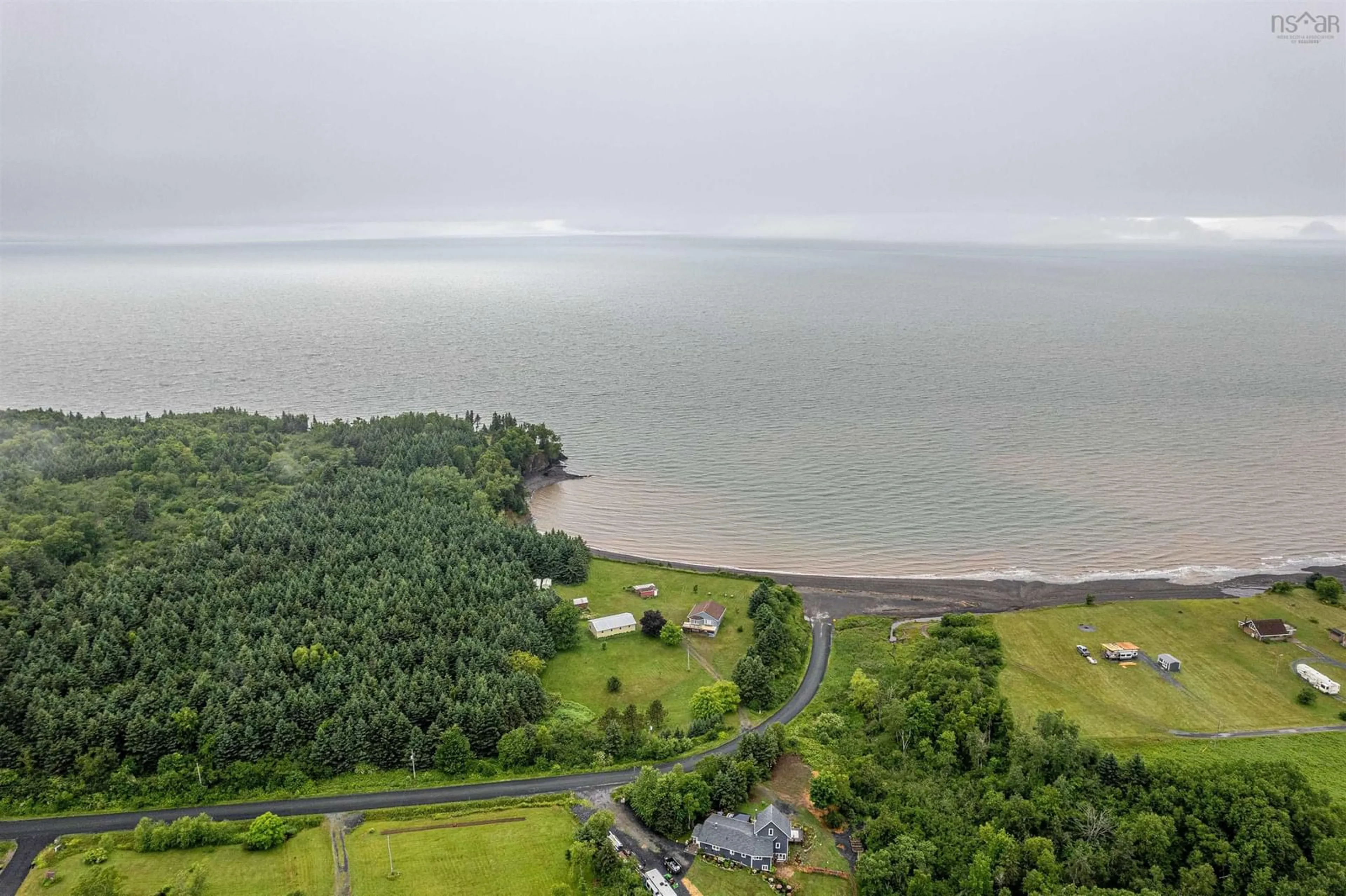 A pic from outside/outdoor area/front of a property/back of a property/a pic from drone, water/lake/river/ocean view for 351 Ocean Beach Rd, Cheverie Nova Scotia B0N 1G0