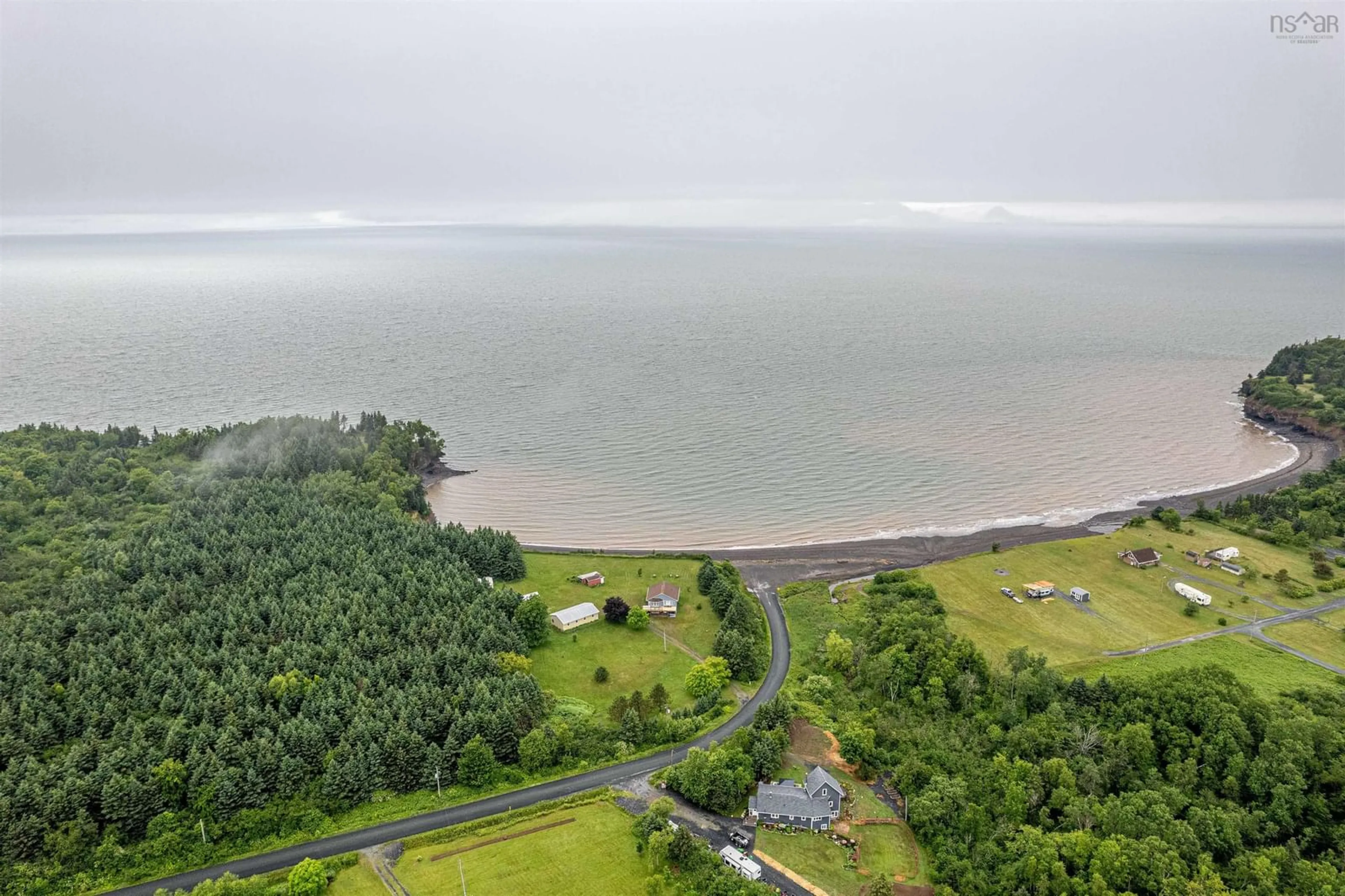 A pic from outside/outdoor area/front of a property/back of a property/a pic from drone, water/lake/river/ocean view for 351 Ocean Beach Rd, Cheverie Nova Scotia B0N 1G0