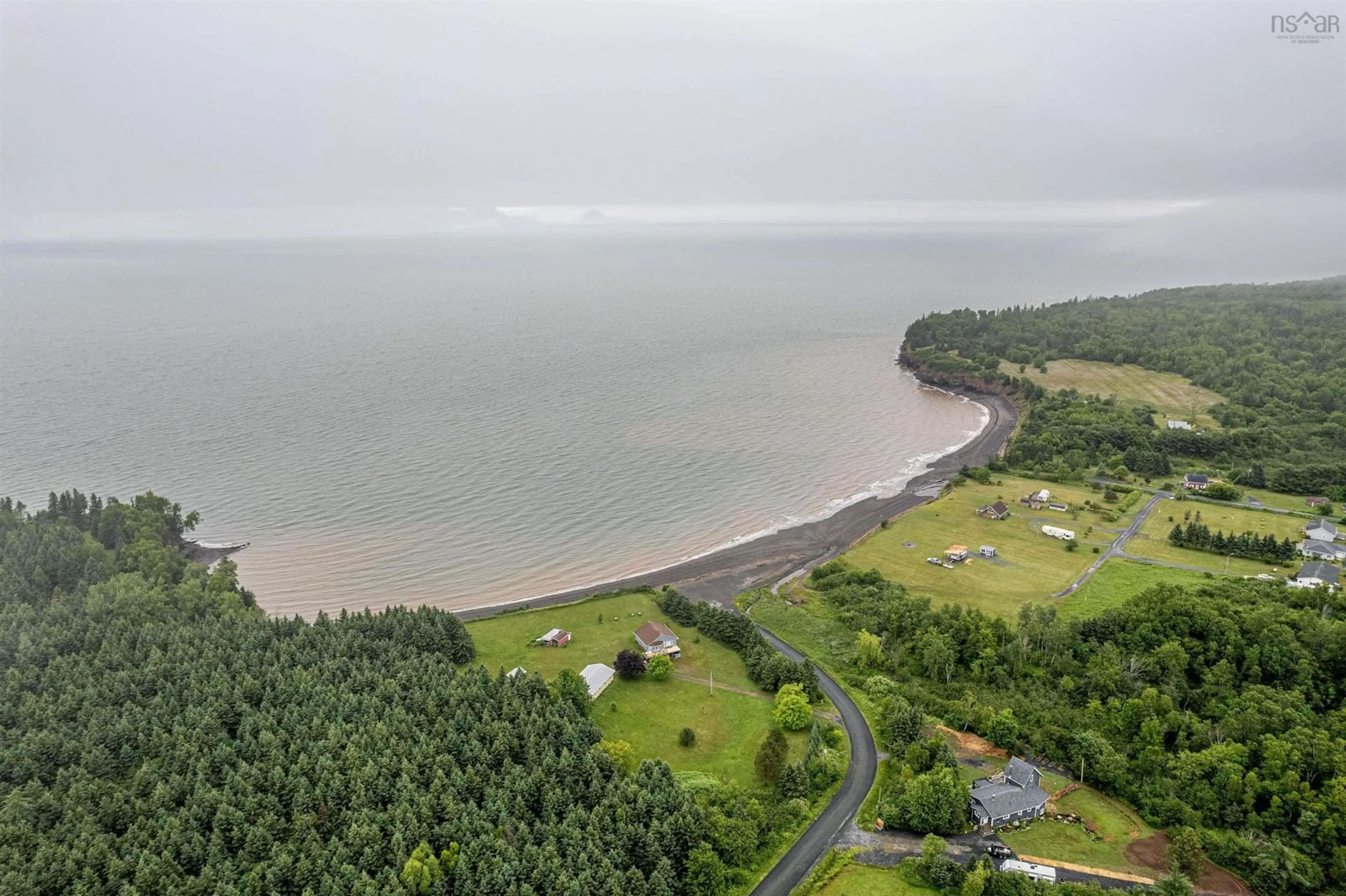 A pic from outside/outdoor area/front of a property/back of a property/a pic from drone, water/lake/river/ocean view for 351 Ocean Beach Rd, Cheverie Nova Scotia B0N 1G0