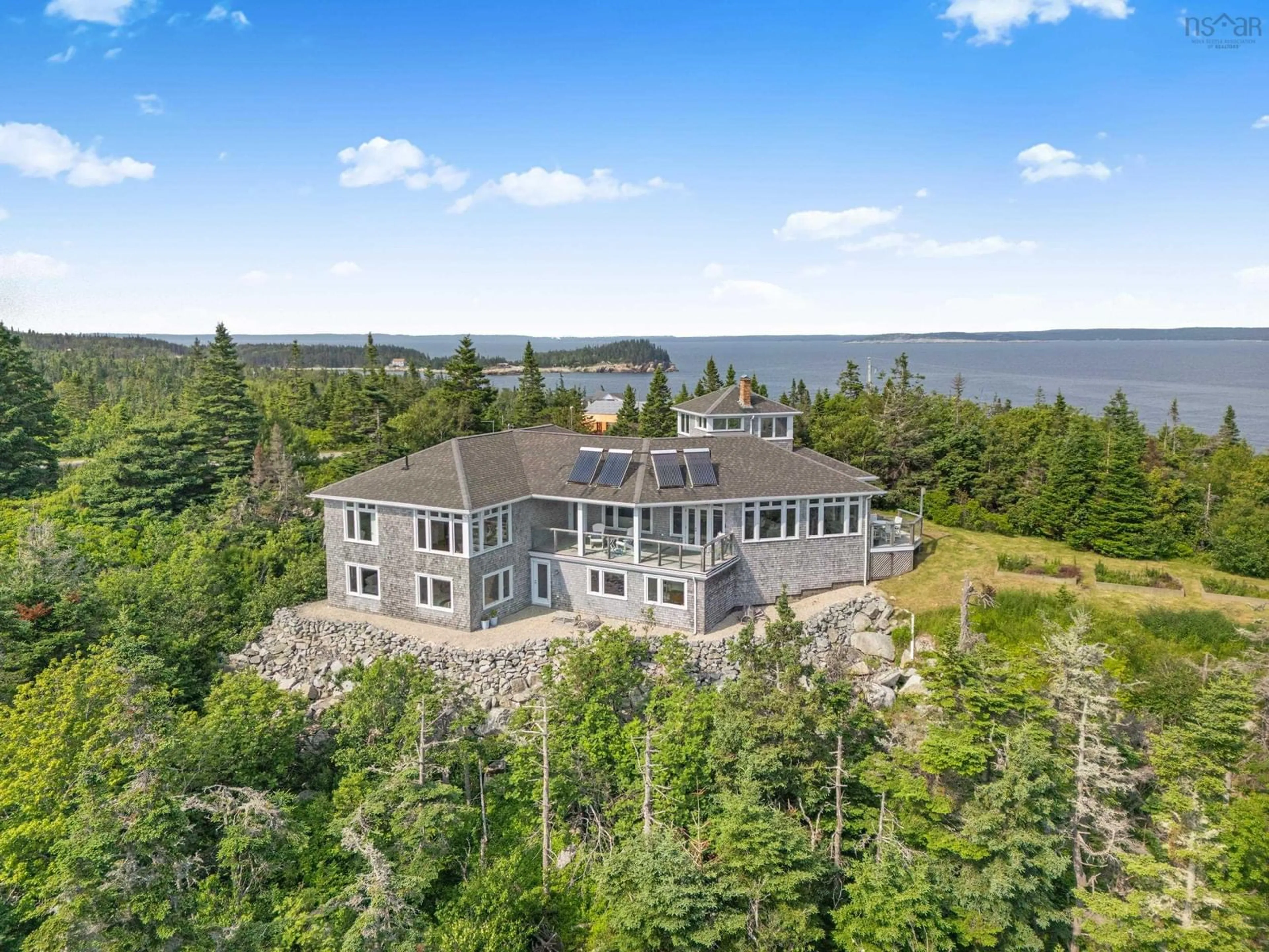 A pic from outside/outdoor area/front of a property/back of a property/a pic from drone, water/lake/river/ocean view for 196 White Point Run, Northwest Cove Nova Scotia B0J 1T0