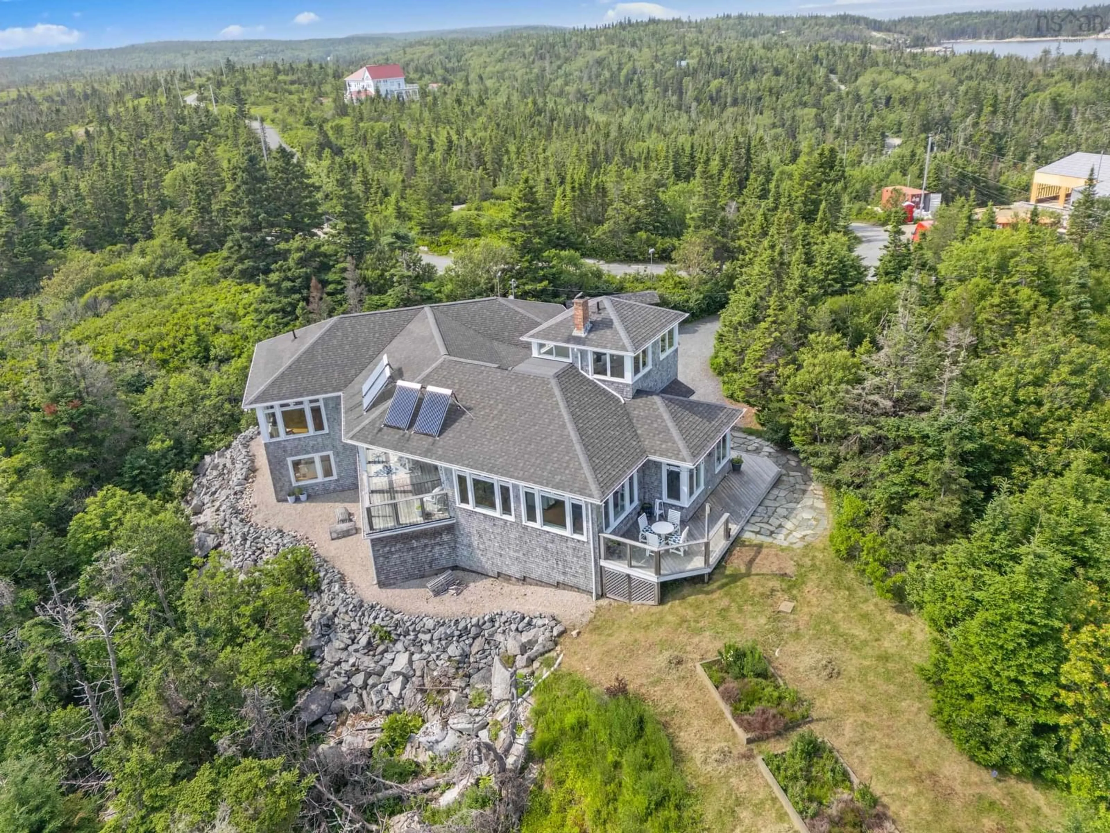 A pic from outside/outdoor area/front of a property/back of a property/a pic from drone, water/lake/river/ocean view for 196 White Point Run, Northwest Cove Nova Scotia B0J 1T0