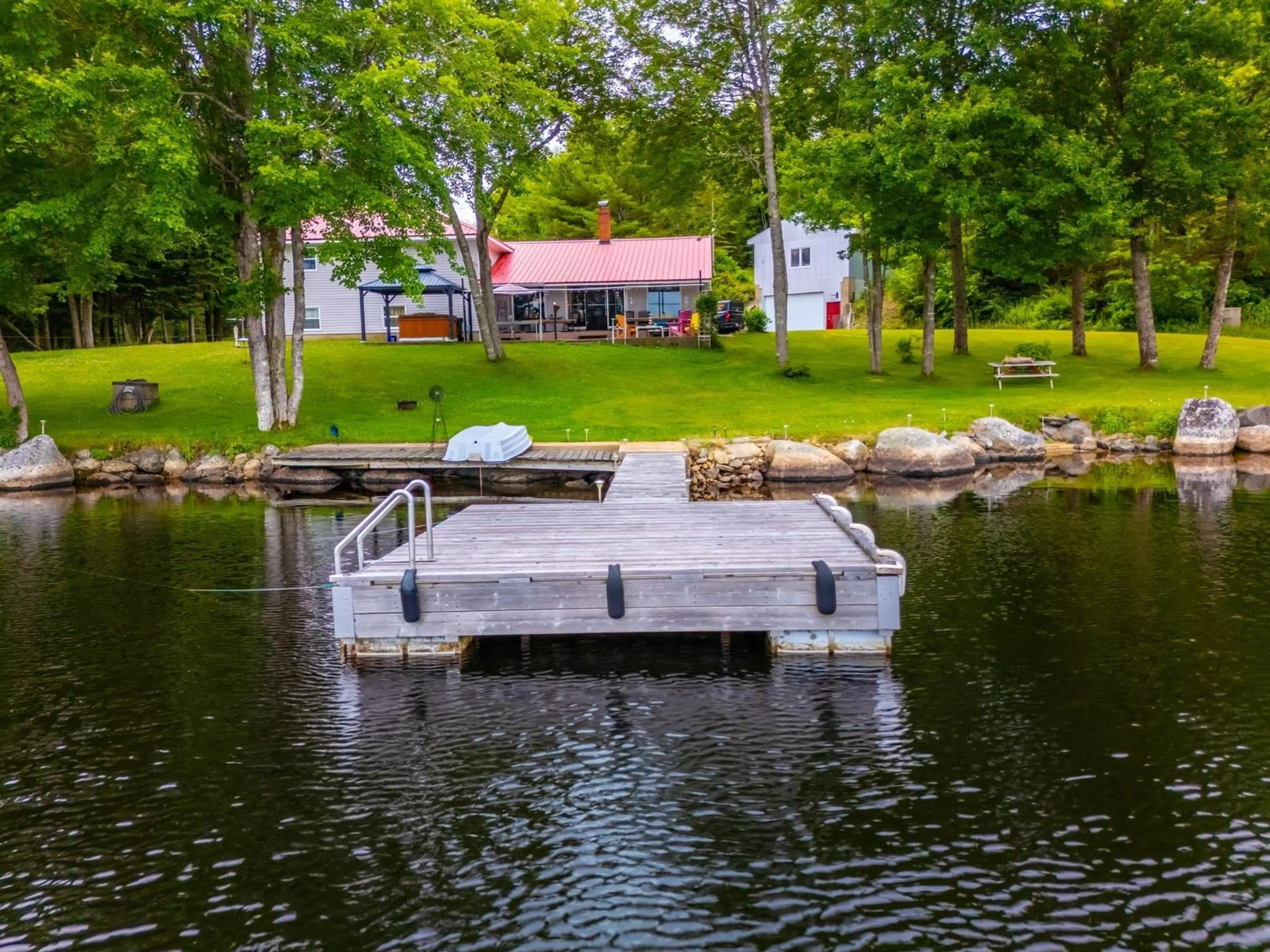 A pic from outside/outdoor area/front of a property/back of a property/a pic from drone, water/lake/river/ocean view for 98 Provost Lake Road, Riverdale Nova Scotia B0W 3T0