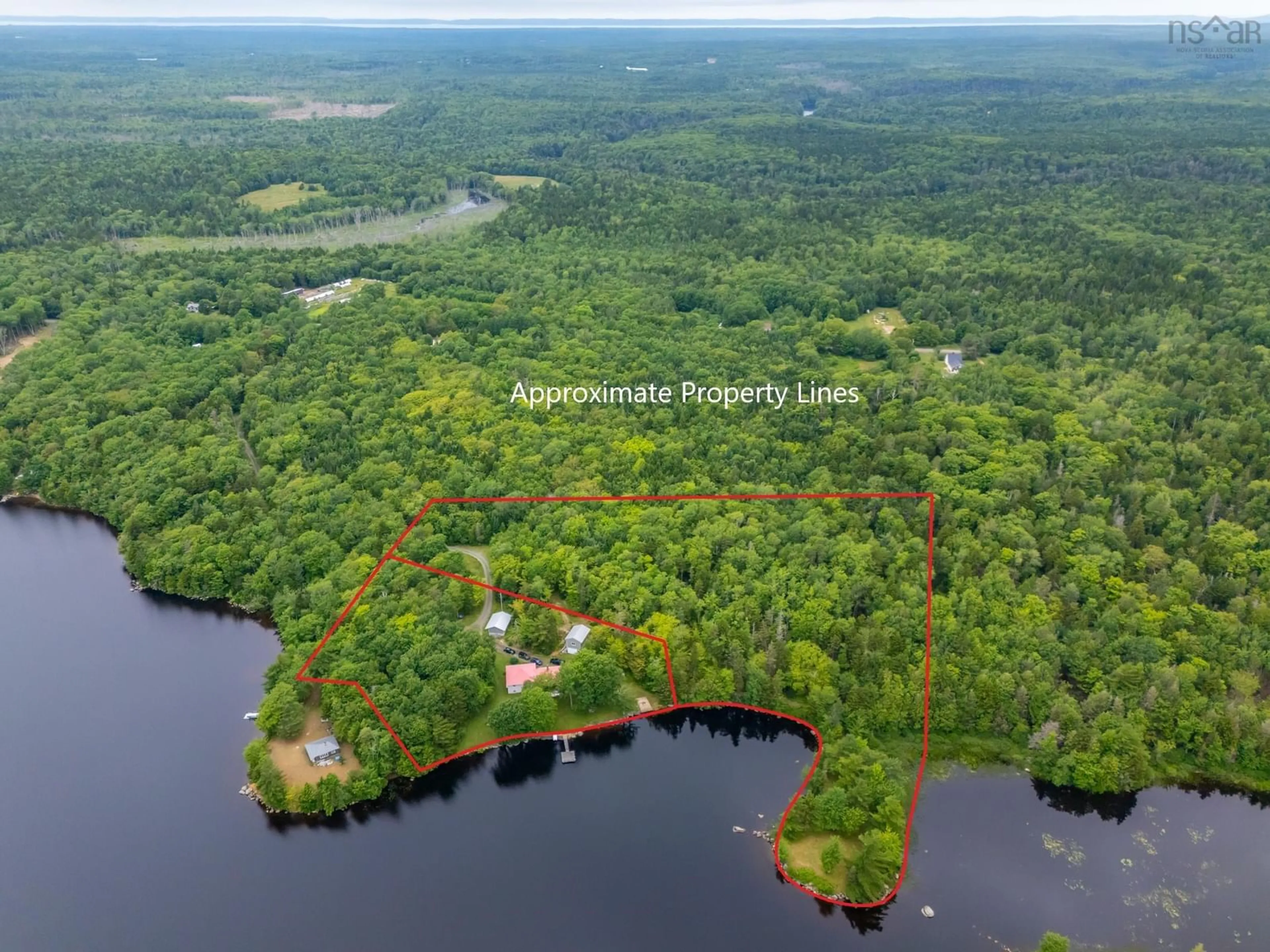 A pic from outside/outdoor area/front of a property/back of a property/a pic from drone, water/lake/river/ocean view for 98 Provost Lake Road, Riverdale Nova Scotia B0W 3T0