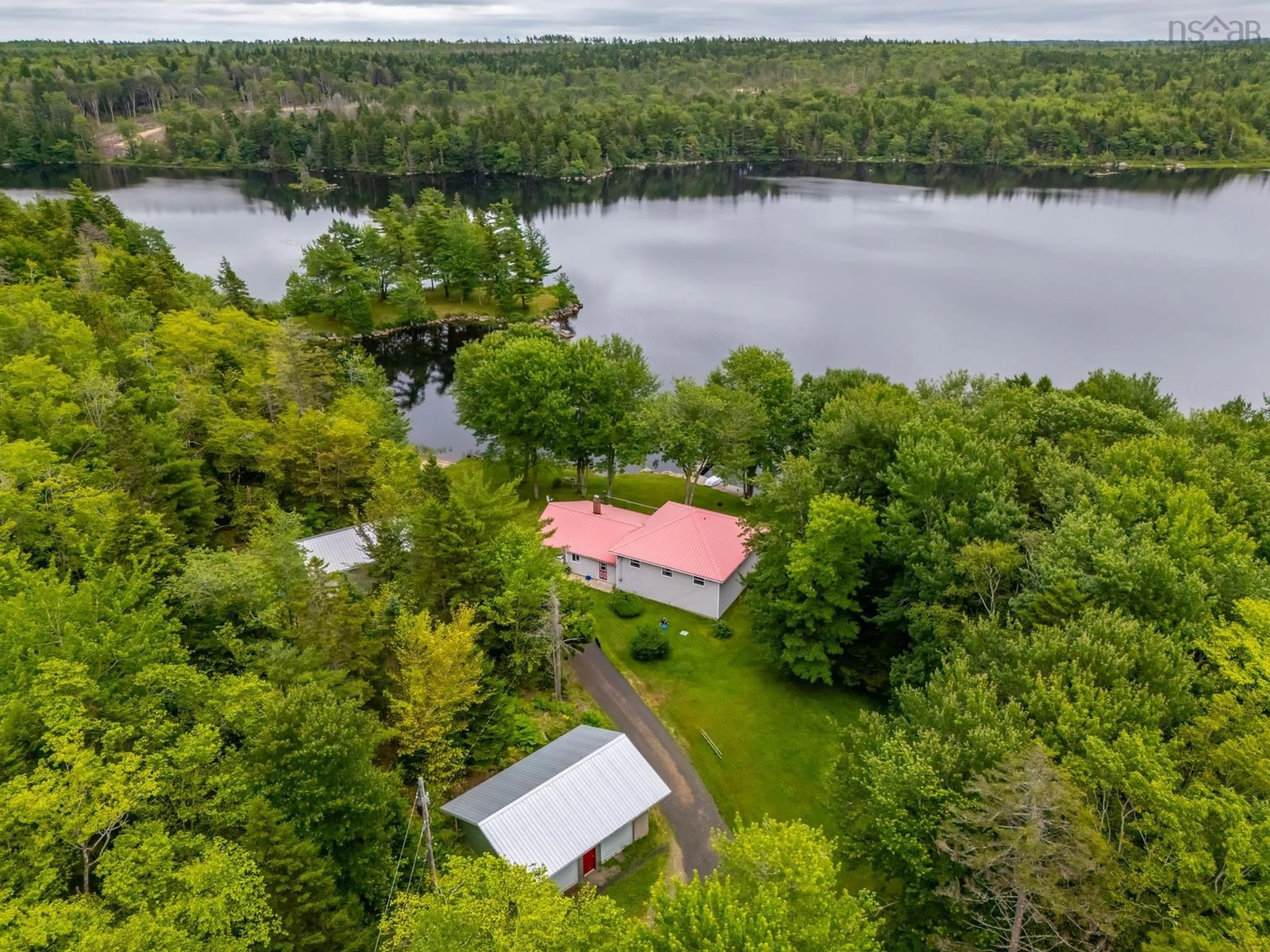 A pic from outside/outdoor area/front of a property/back of a property/a pic from drone, water/lake/river/ocean view for 98 Provost Lake Road, Riverdale Nova Scotia B0W 3T0