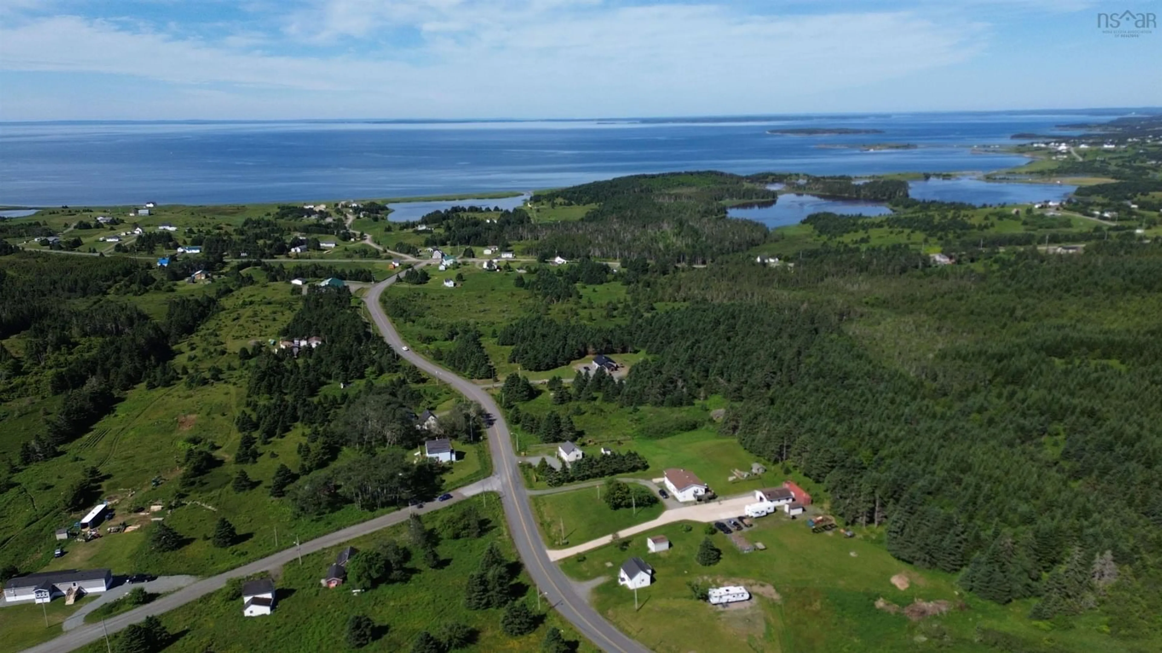 A pic from outside/outdoor area/front of a property/back of a property/a pic from drone, water/lake/river/ocean view for 115 St Peters Fourchu Rd, Lower L'Ardoise Nova Scotia B0E 1W0
