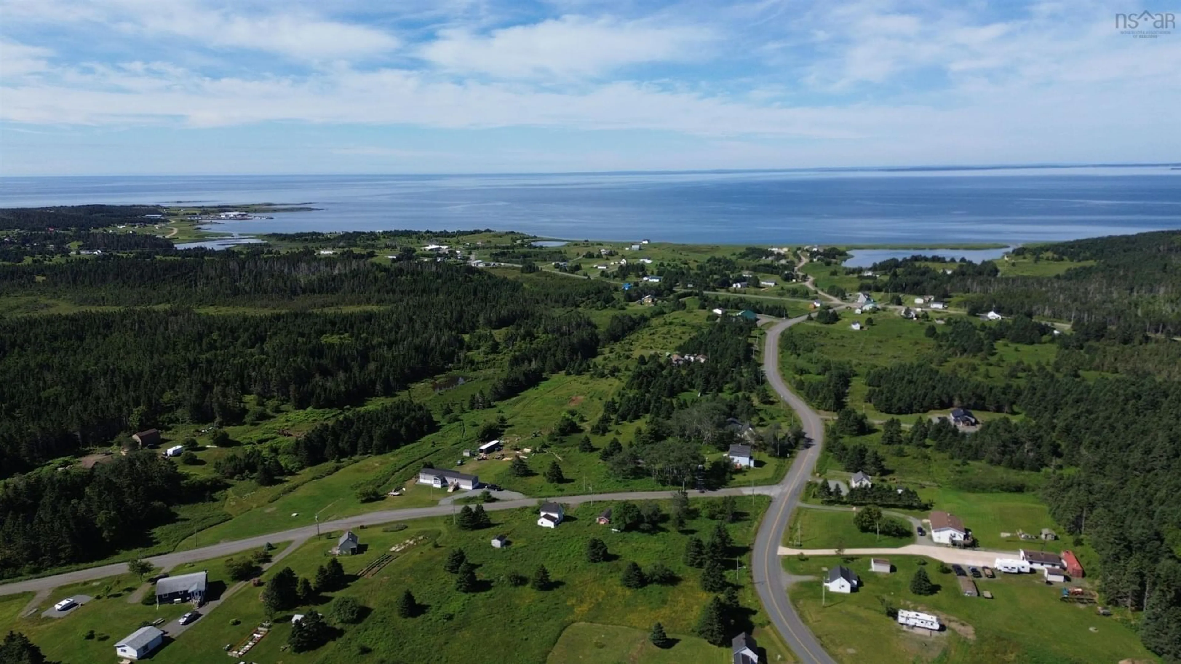 A pic from outside/outdoor area/front of a property/back of a property/a pic from drone, water/lake/river/ocean view for 115 St Peters Fourchu Rd, Lower L'Ardoise Nova Scotia B0E 1W0