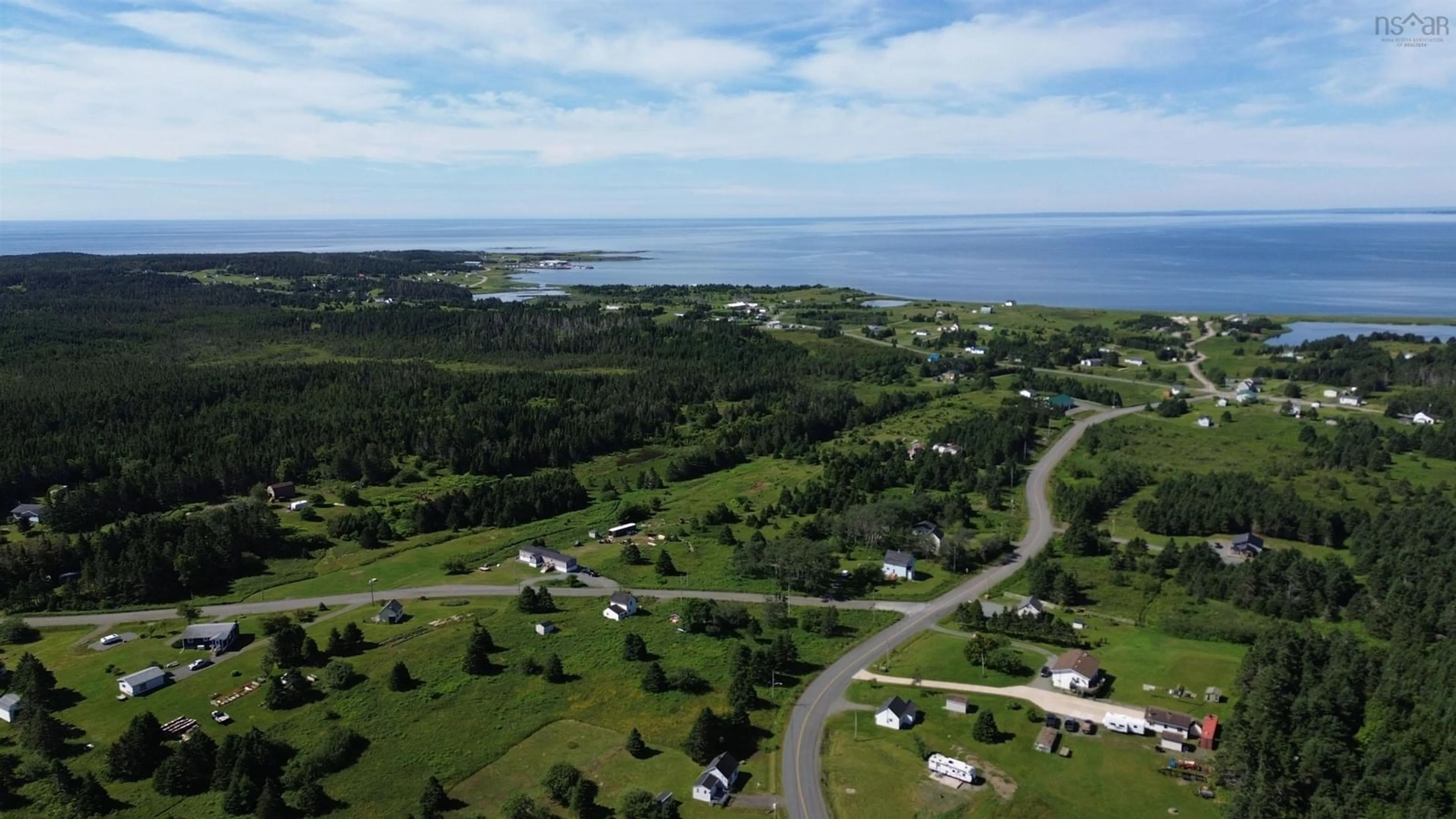 A pic from outside/outdoor area/front of a property/back of a property/a pic from drone, water/lake/river/ocean view for 115 St Peters Fourchu Rd, Lower L'Ardoise Nova Scotia B0E 1W0