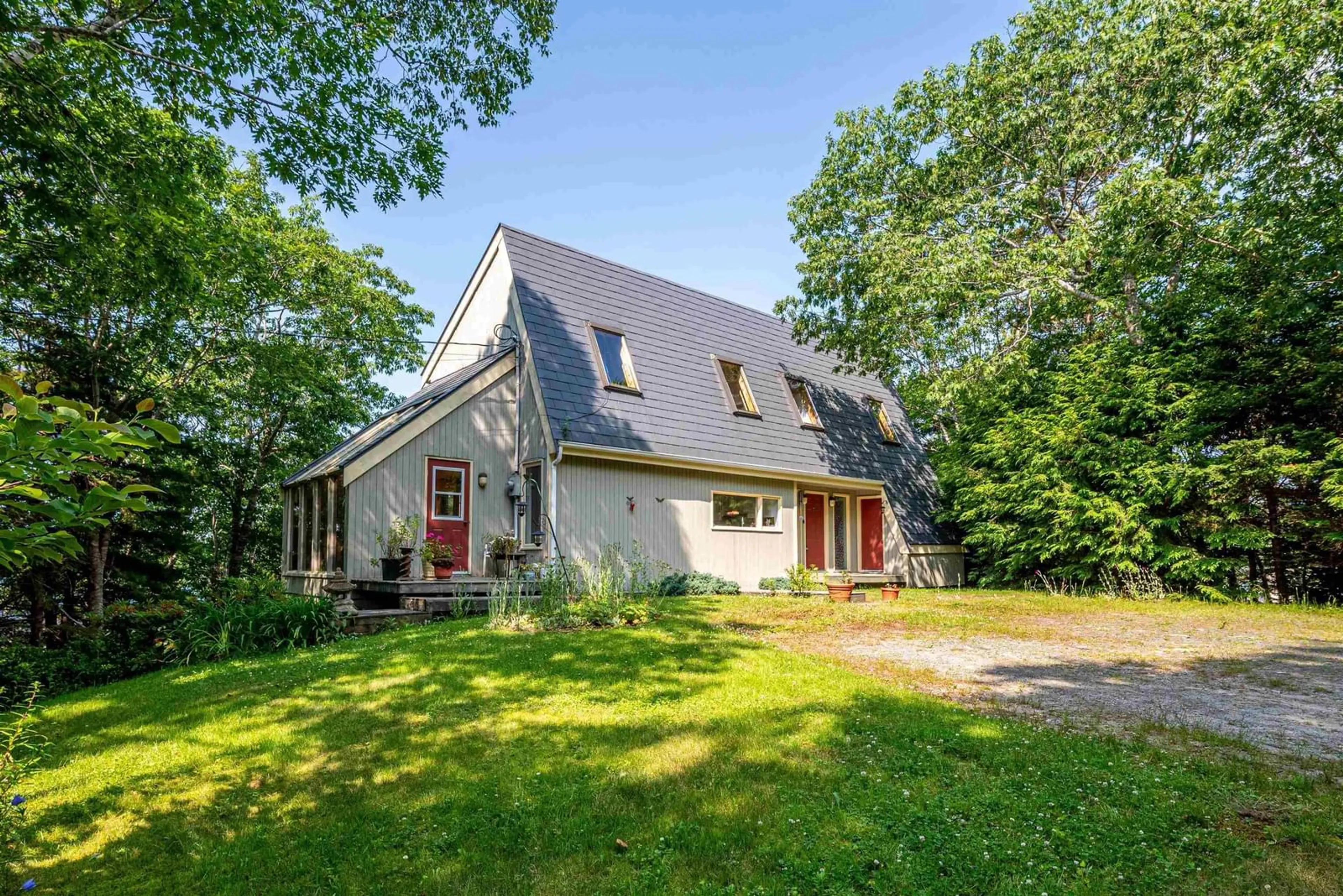 A pic from outside/outdoor area/front of a property/back of a property/a pic from drone, street for 13576 Peggys Cove Rd, Upper Tantallon Nova Scotia B3Z 2J2