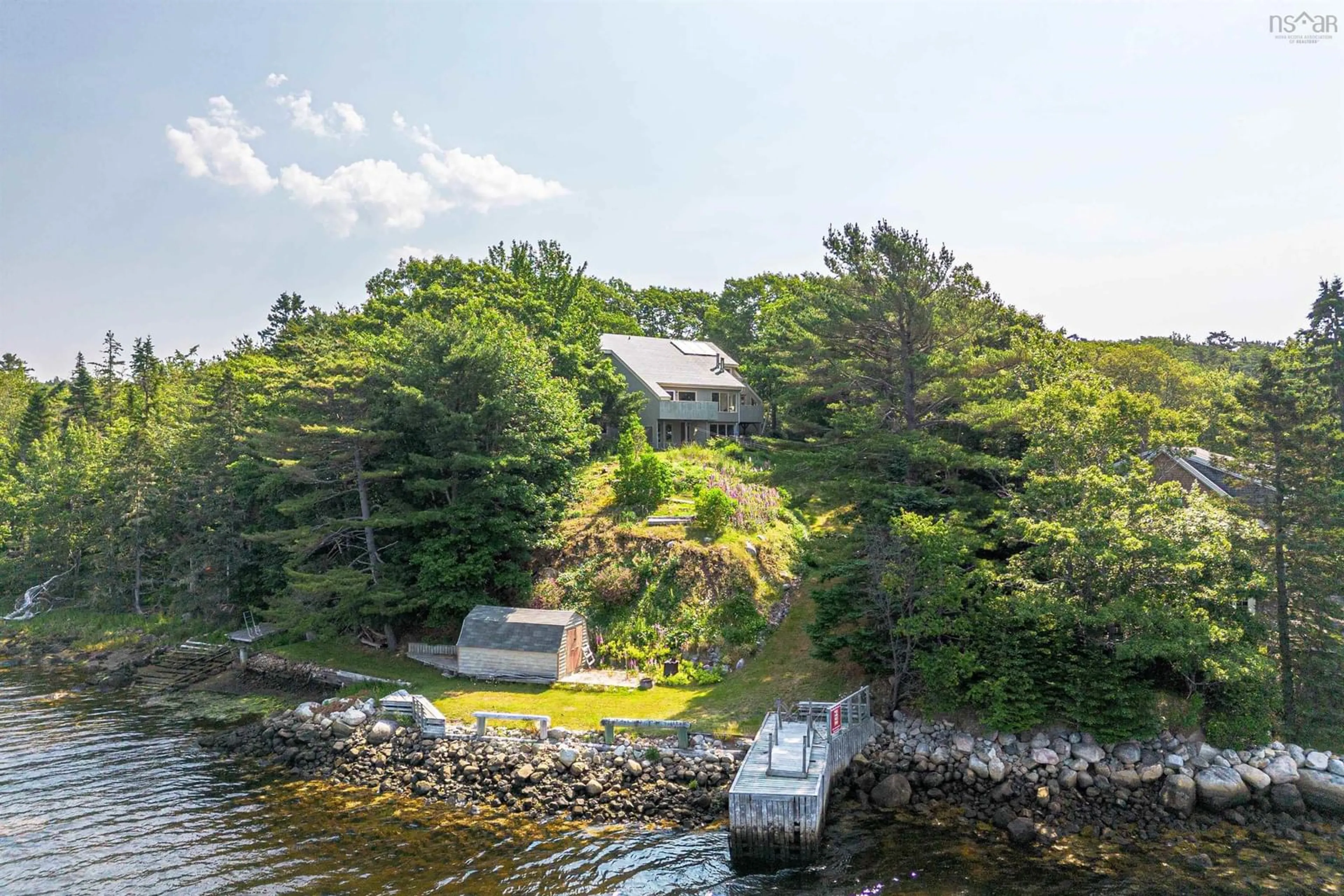 A pic from outside/outdoor area/front of a property/back of a property/a pic from drone, water/lake/river/ocean view for 13576 Peggys Cove Rd, Upper Tantallon Nova Scotia B3Z 2J2