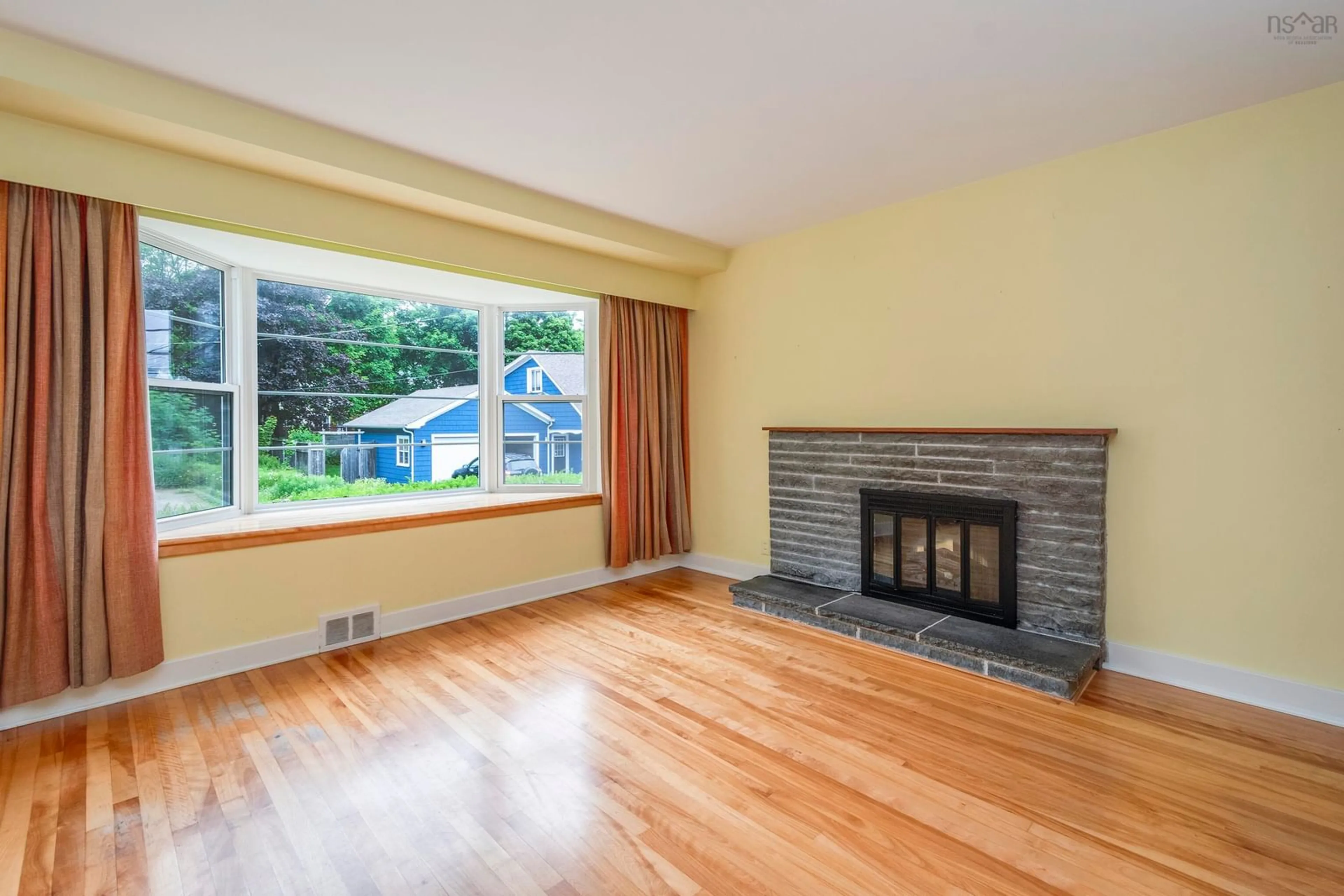 Living room with furniture, wood/laminate floor for 14 Retreat Ave, Halifax Nova Scotia B3N 1Y2
