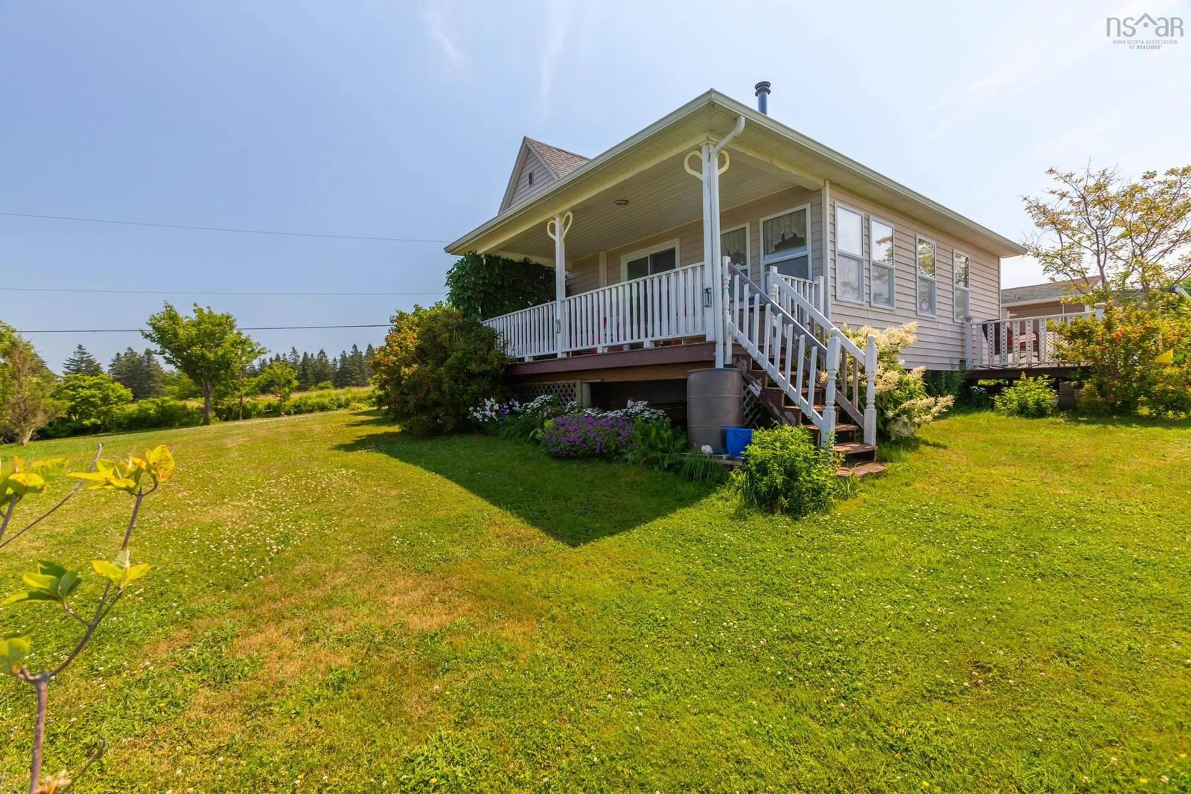 A pic from outside/outdoor area/front of a property/back of a property/a pic from drone, water/lake/river/ocean view for 27 Port Lorne Rd, Mount Rose Nova Scotia B0S 1R0
