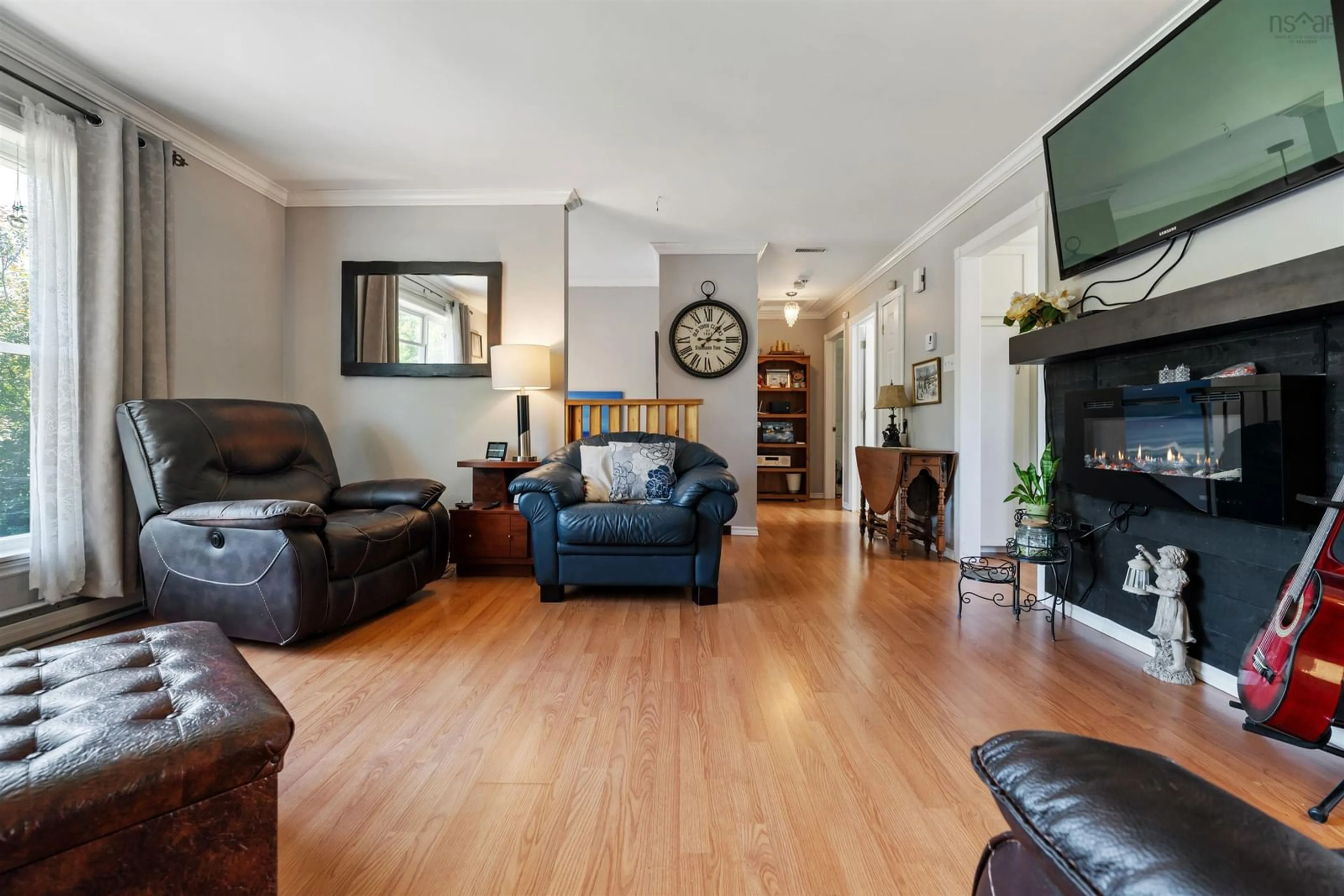 Living room with furniture, wood/laminate floor for 8 Brook Court, Elmsdale Nova Scotia B2S 1J7