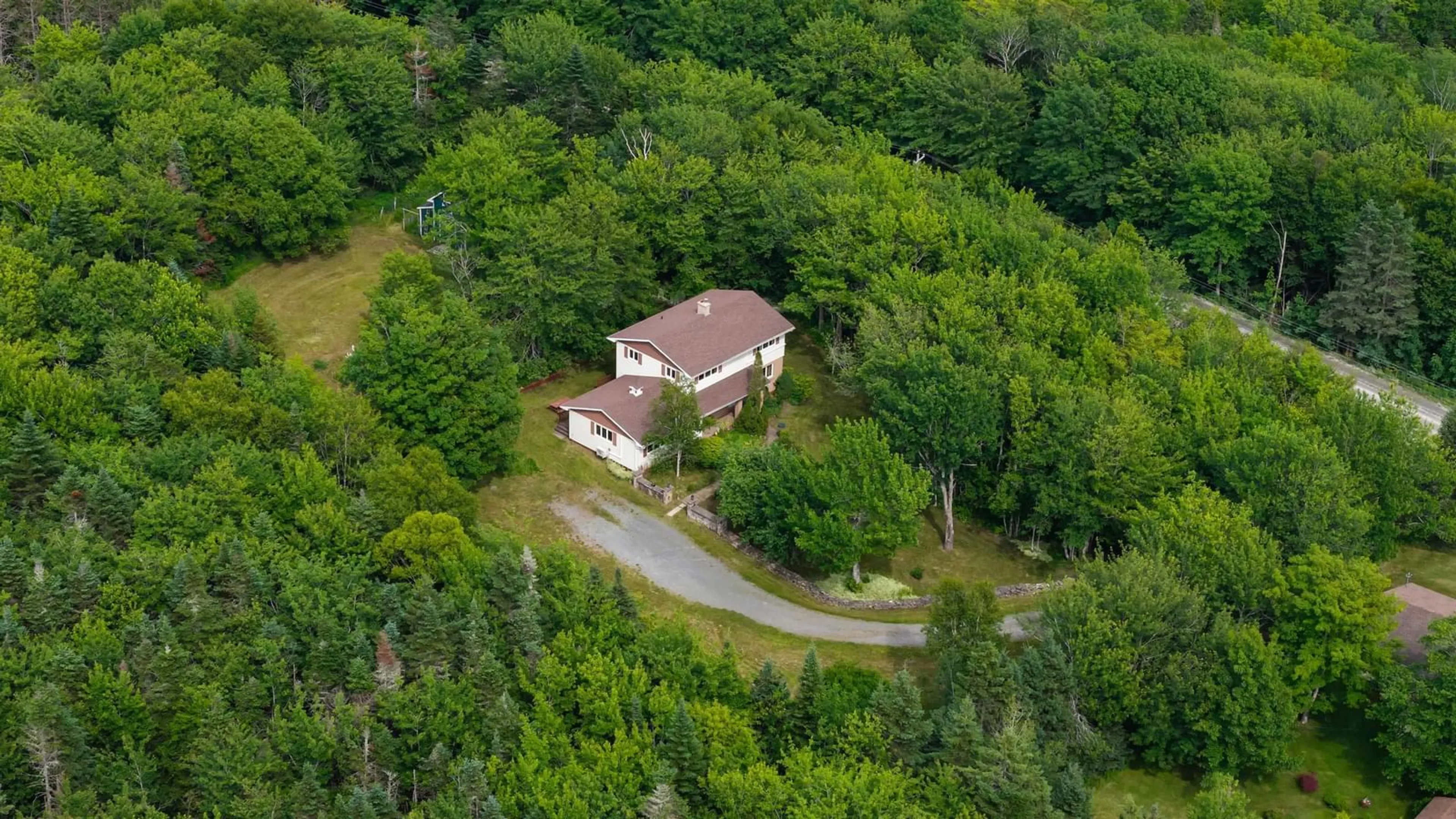 A pic from outside/outdoor area/front of a property/back of a property/a pic from drone, unknown for 131 Fairmont Rd, Cloverville Nova Scotia B2G 2K9