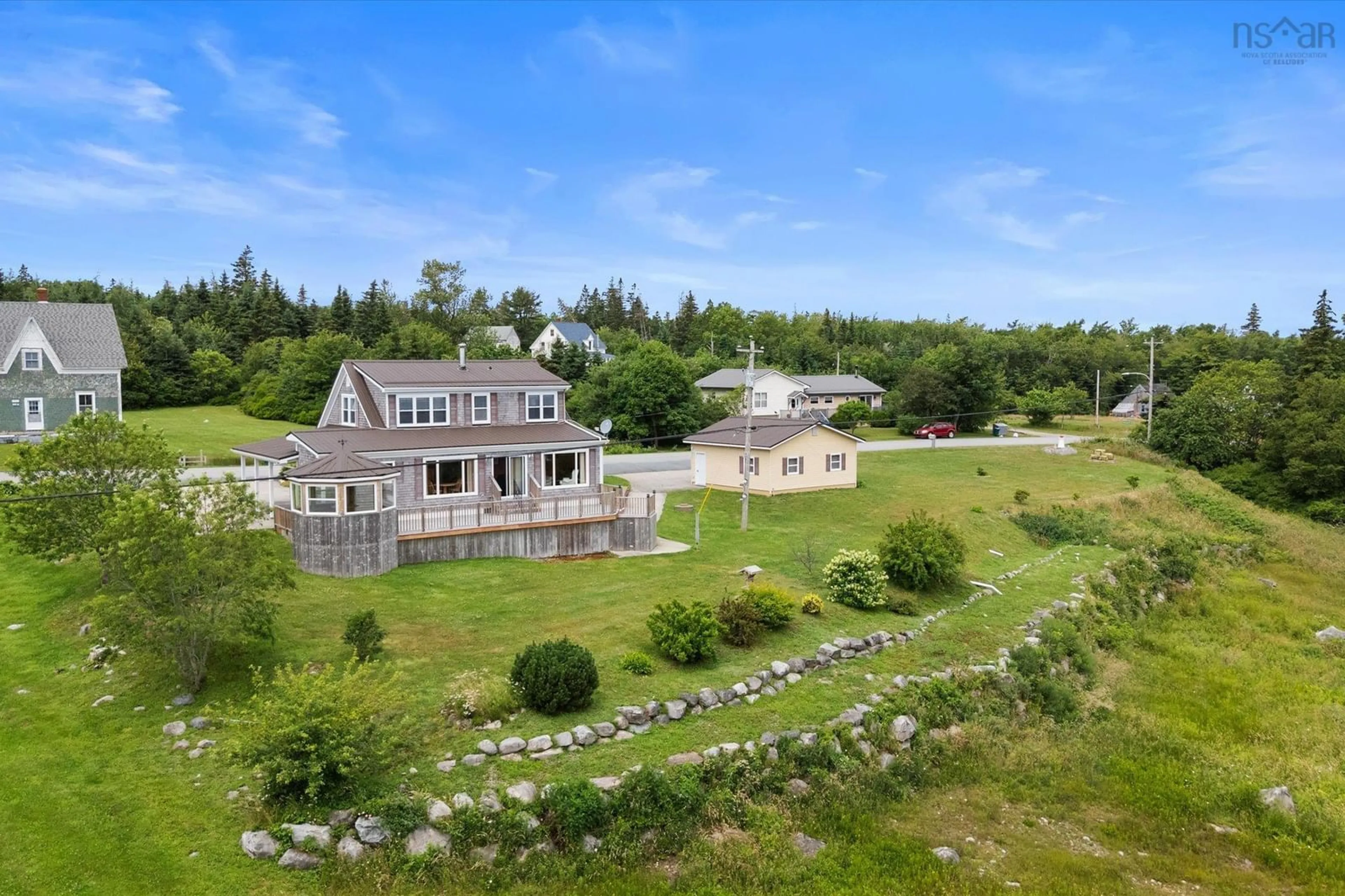 A pic from outside/outdoor area/front of a property/back of a property/a pic from drone, water/lake/river/ocean view for 3384 Sandy Point Rd, Jordan Bay Nova Scotia B0T 1W0