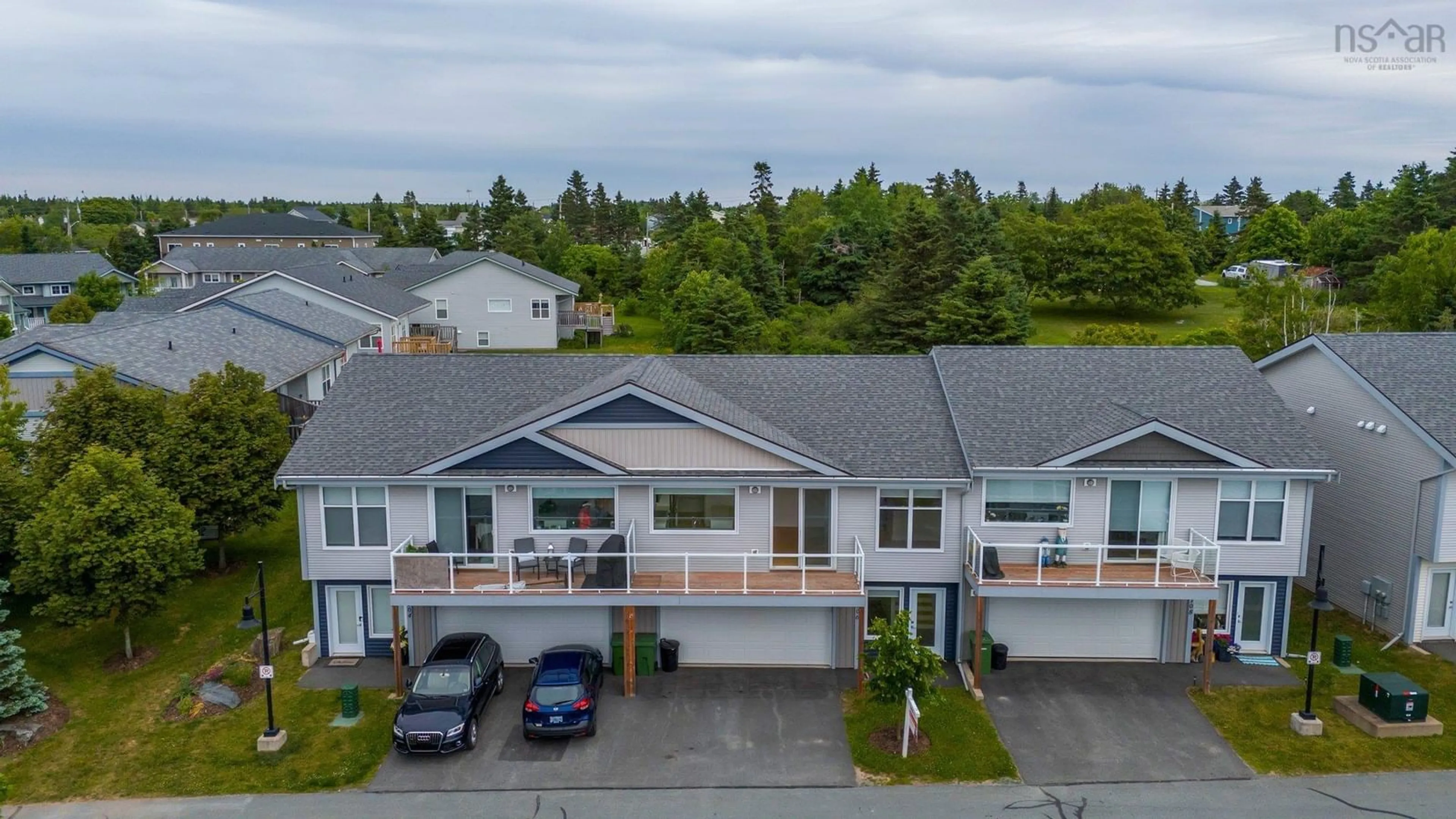 A pic from outside/outdoor area/front of a property/back of a property/a pic from drone, street for 106 Sailors Trail #91, Eastern Passage Nova Scotia B3G 1A1