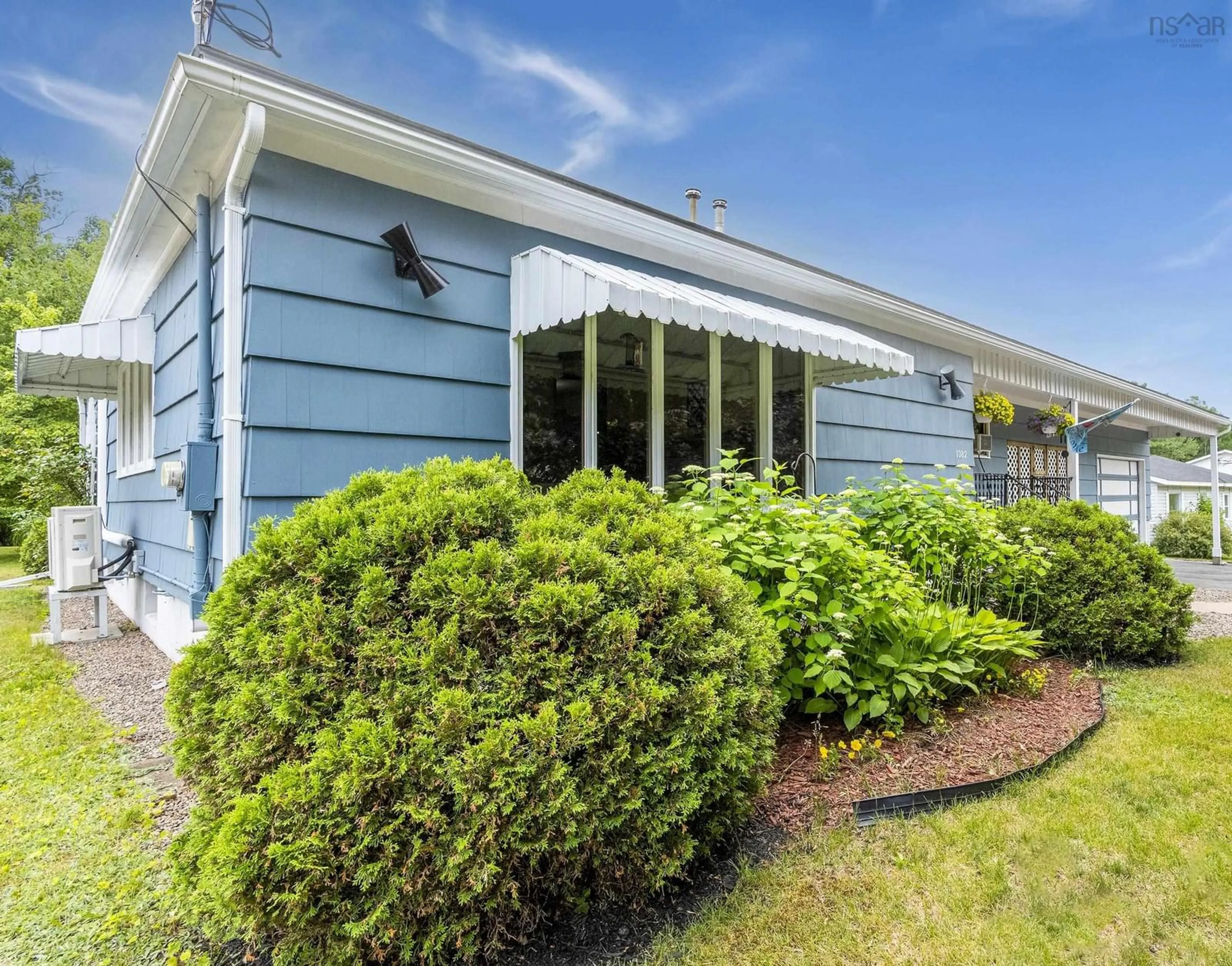 Home with vinyl exterior material, street for 1082 Sandy Court Crt, Aylesford Nova Scotia B0P 1C0