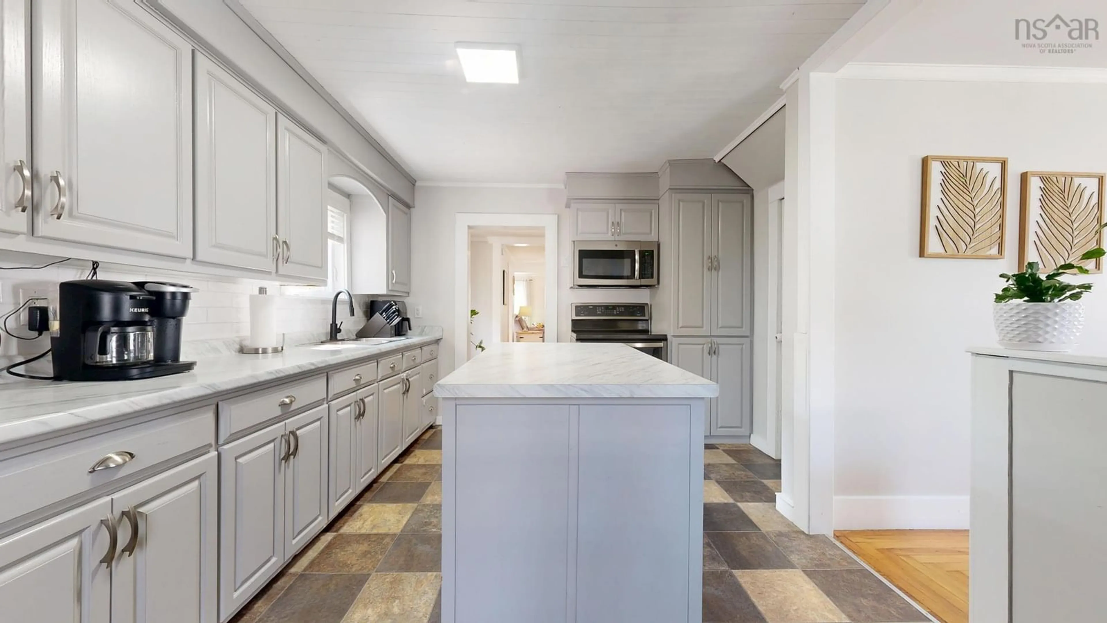 Open concept kitchen, ceramic/tile floor for 36 North St, Lockeport Nova Scotia B0T 1L0