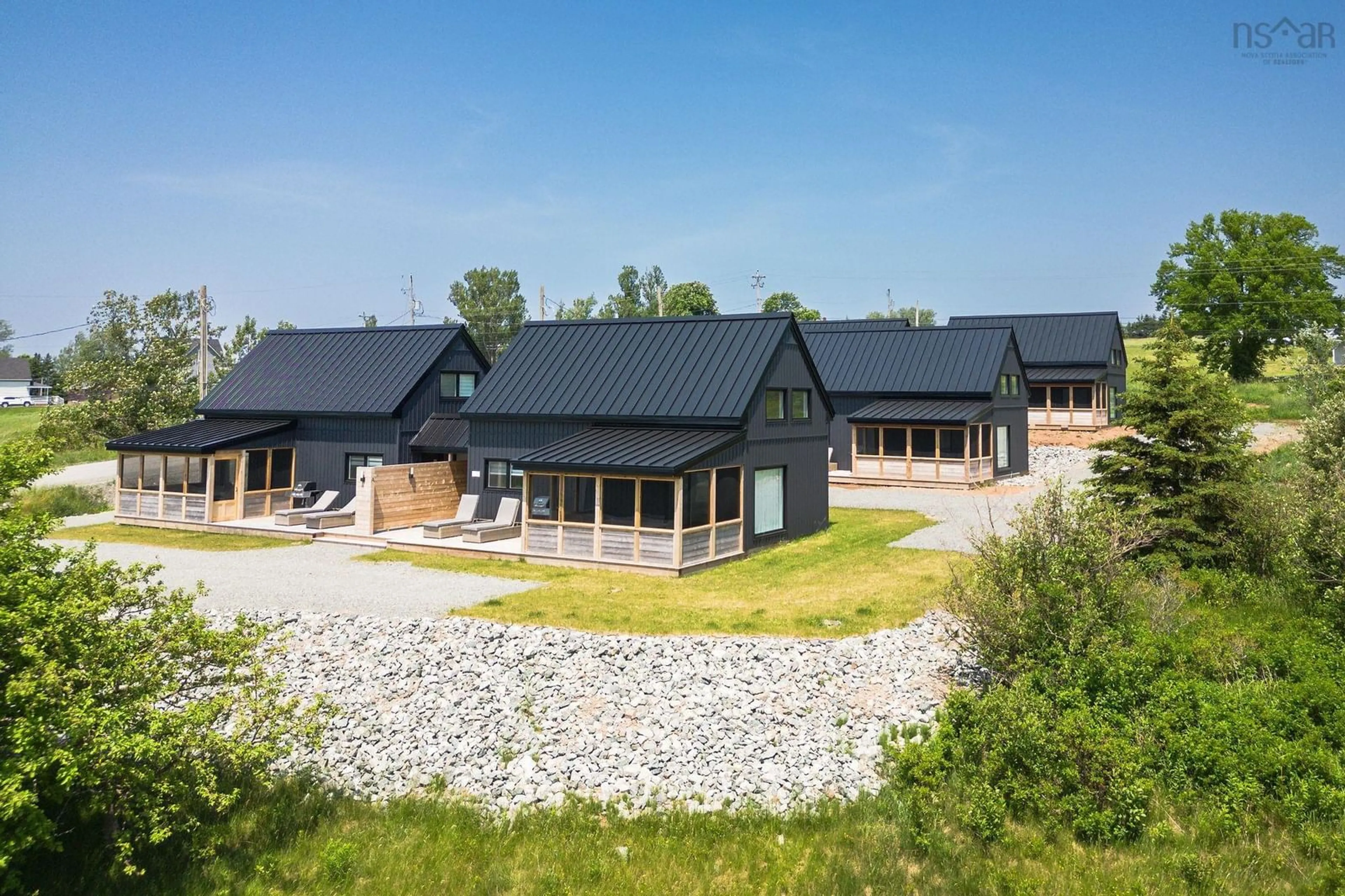 A pic from outside/outdoor area/front of a property/back of a property/a pic from drone, building for 15 Shore Rd, Harbourview Nova Scotia B0E 2W0