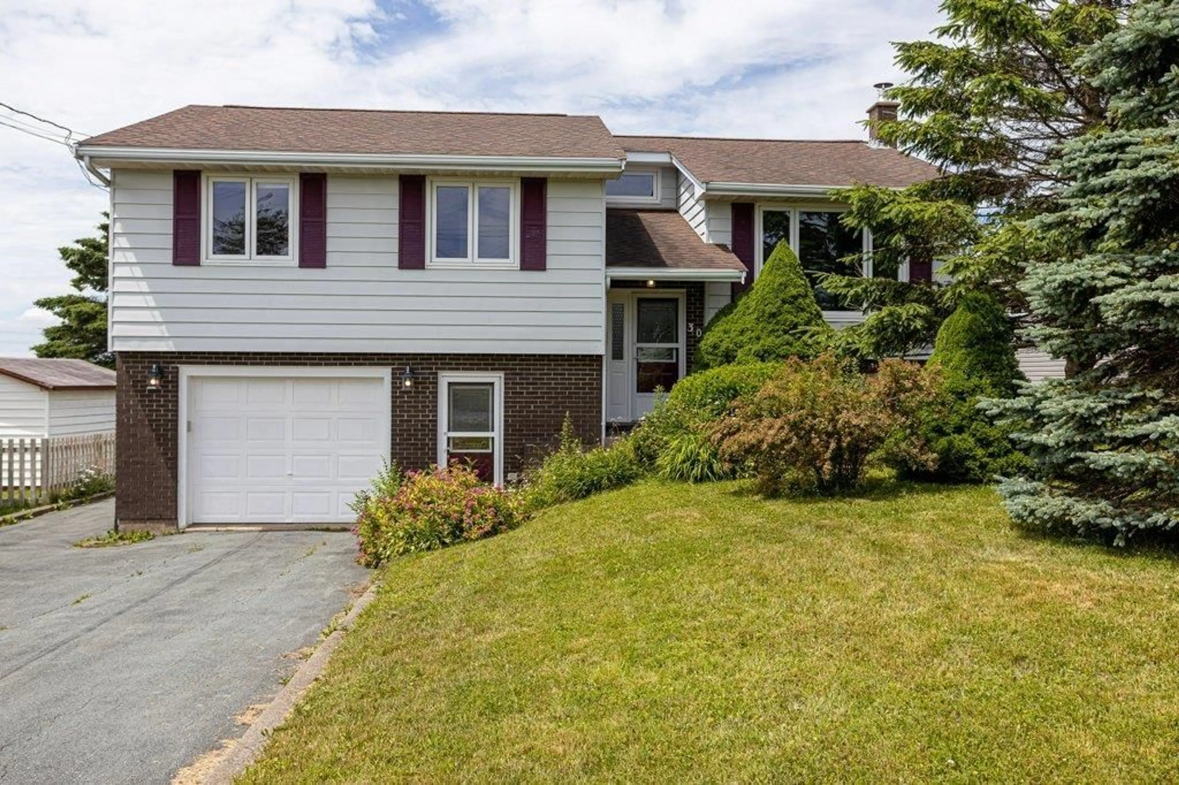 Home with vinyl exterior material, street for 30 Redoubt Way, Eastern Passage Nova Scotia B3G 1G1