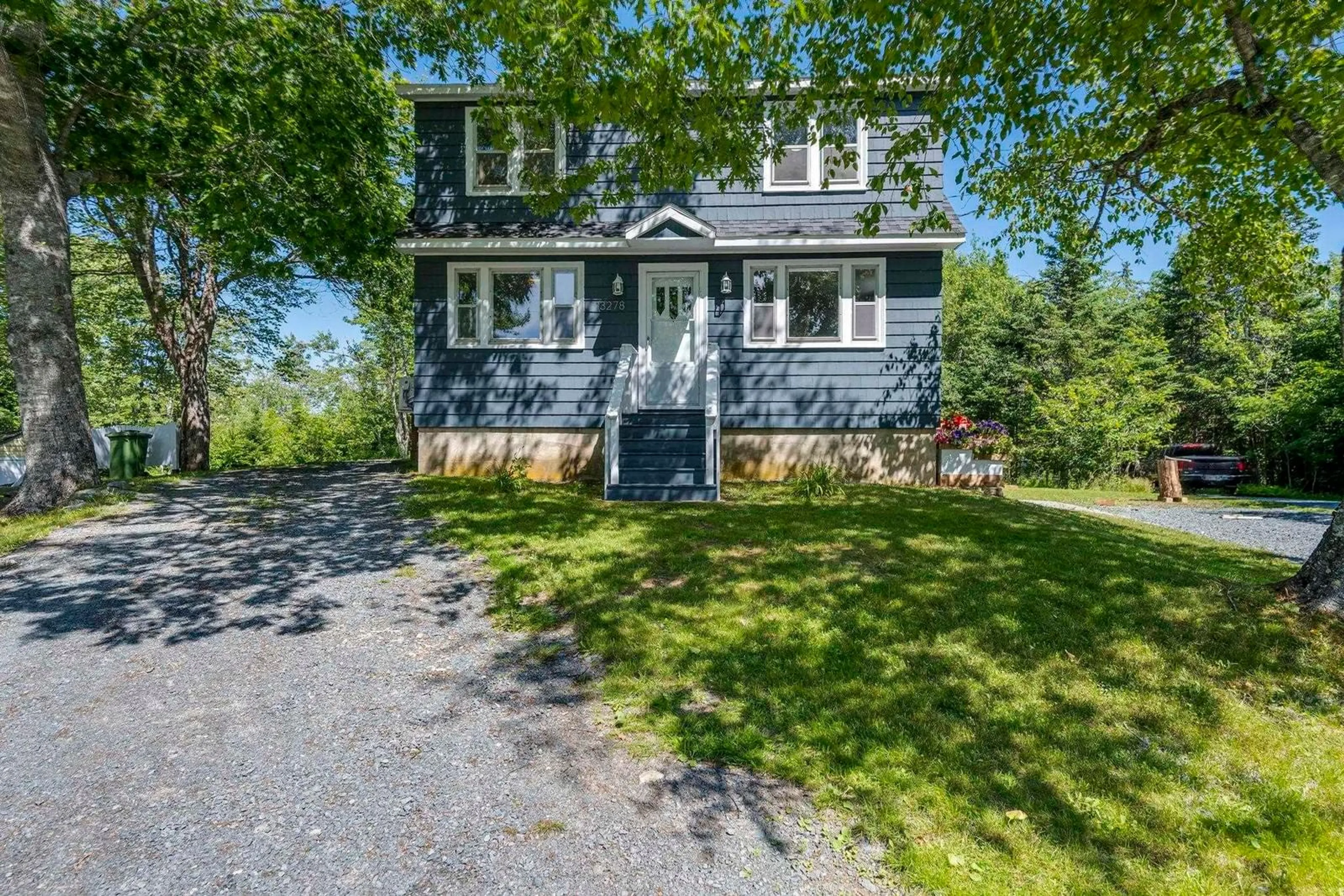 A pic from outside/outdoor area/front of a property/back of a property/a pic from drone, street for 13278 Highway 7, Ship Harbour Nova Scotia B0J 2L0