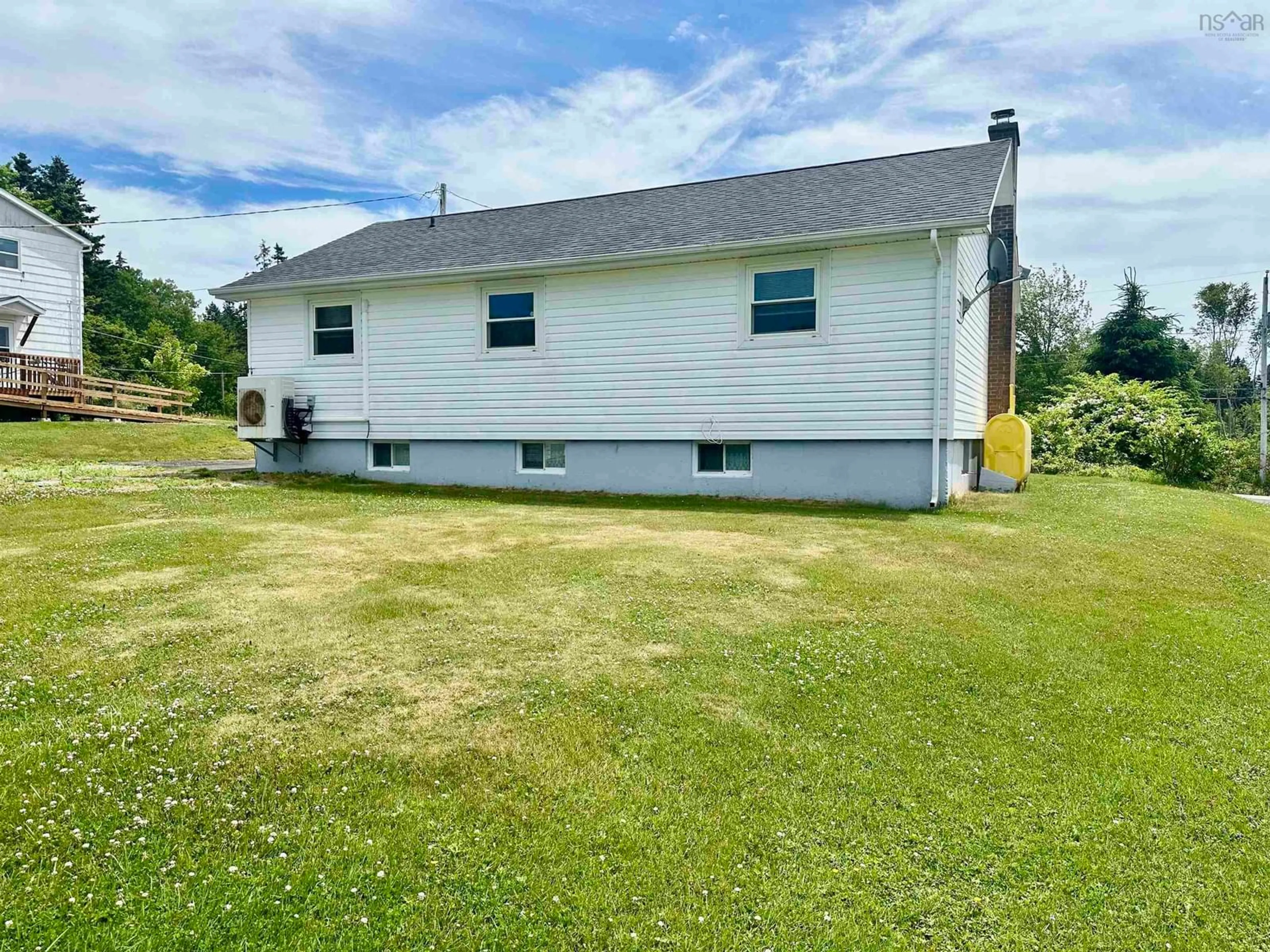 A pic from outside/outdoor area/front of a property/back of a property/a pic from drone, building for 69 Kings Rd, Port Hastings Nova Scotia B9A 1N9