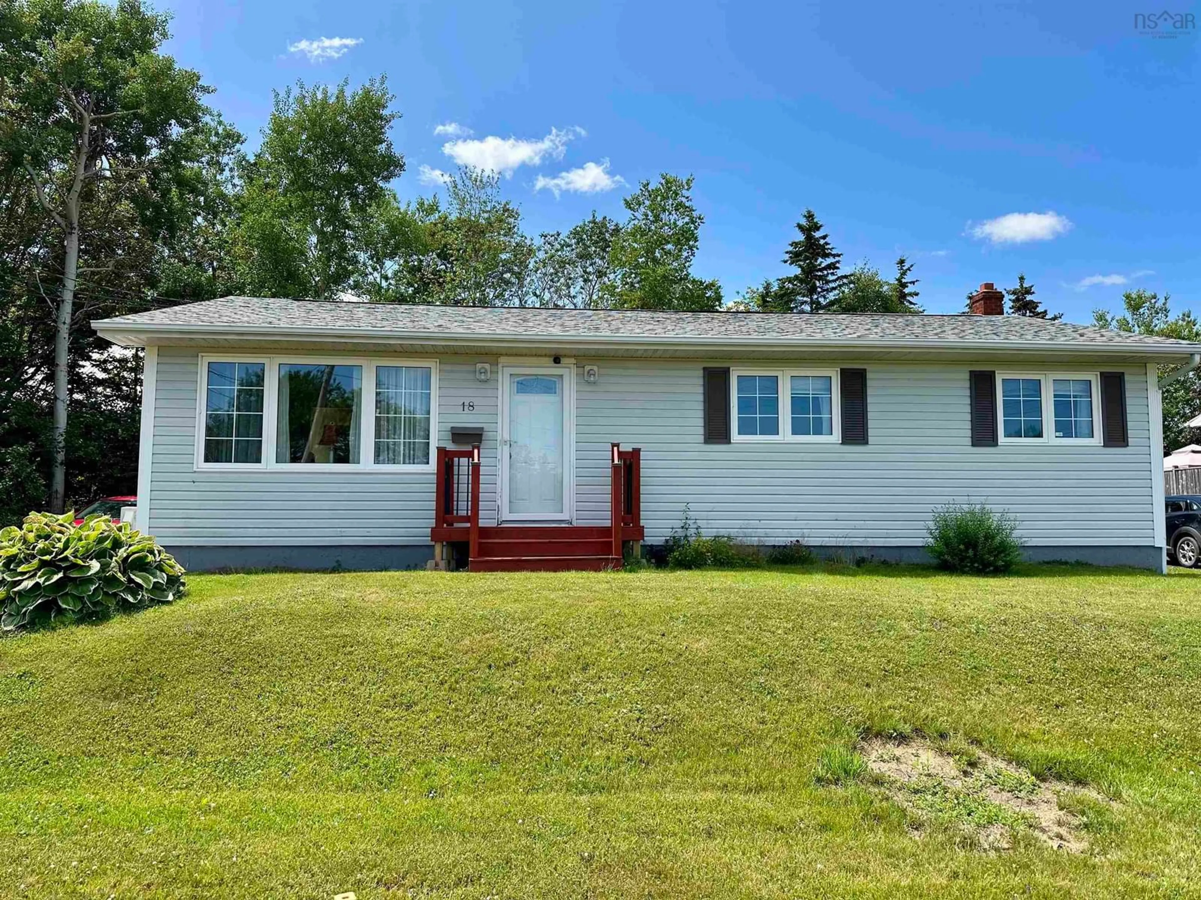 Home with vinyl exterior material, street for 18 Pat St, Sydney Nova Scotia B1S 2L4