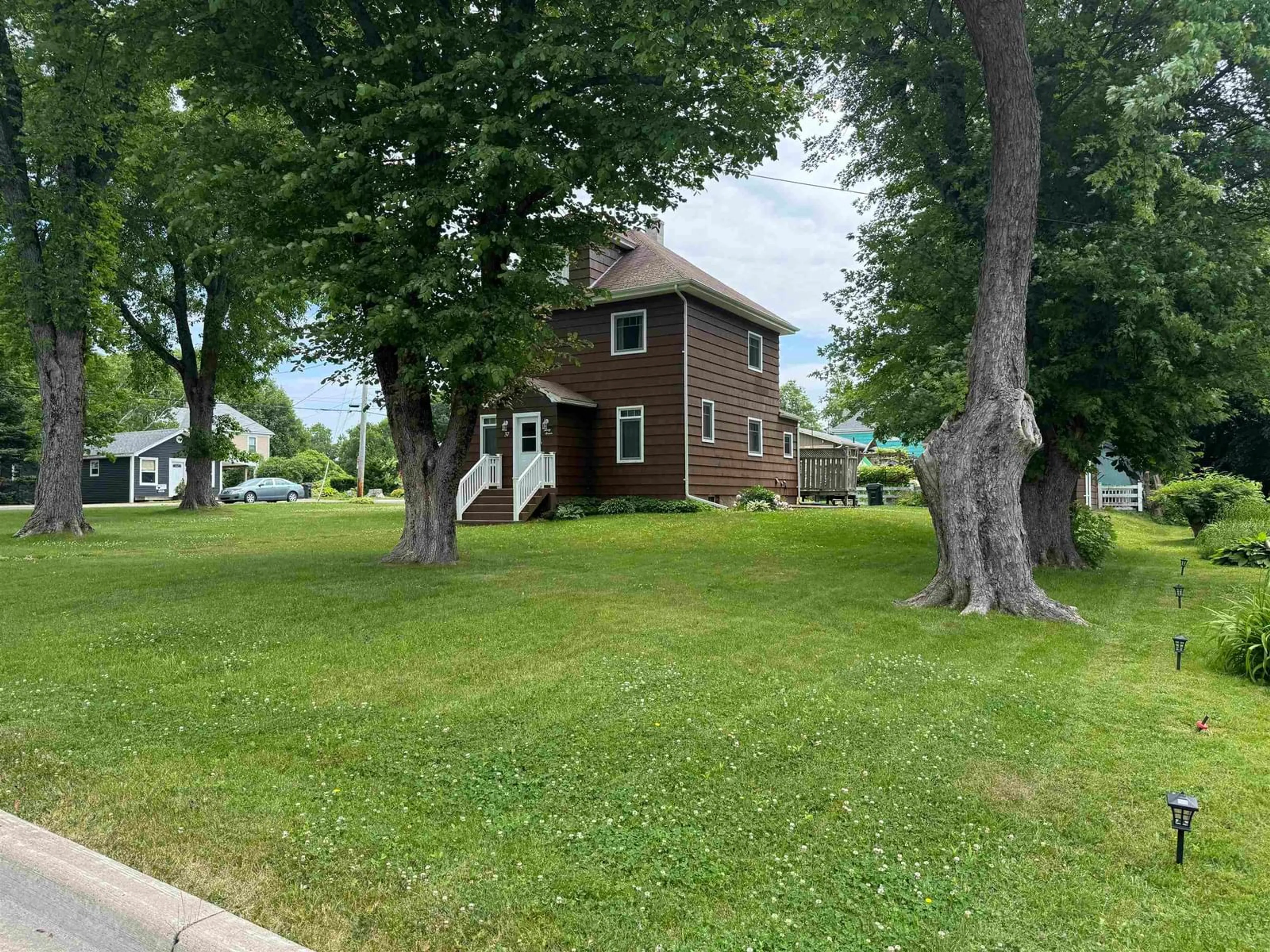 A pic from outside/outdoor area/front of a property/back of a property/a pic from drone, water/lake/river/ocean view for 37 Beech St, Sydney Mines Nova Scotia B1V 1J2