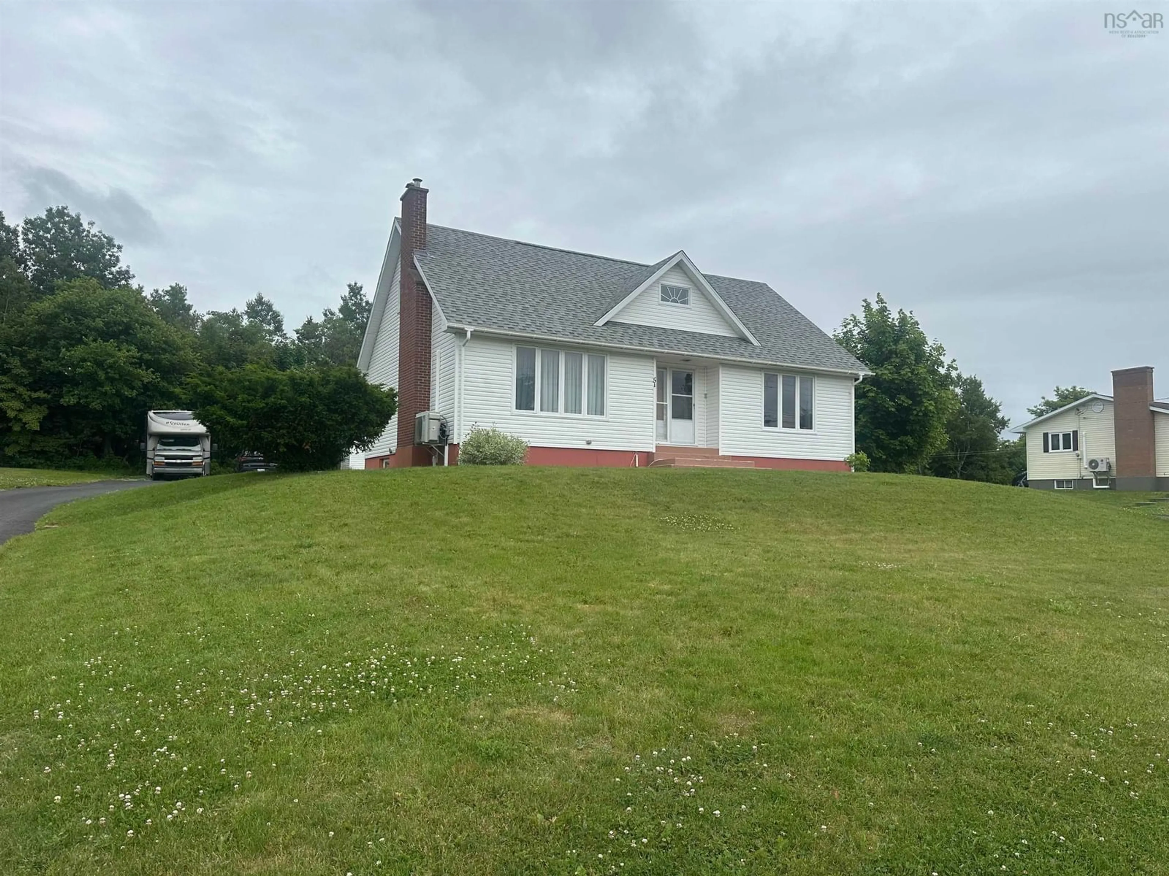 A pic from outside/outdoor area/front of a property/back of a property/a pic from drone, unknown for 51 Rendell Dr, Little Bras D'Or Nova Scotia B1Y 2Y7