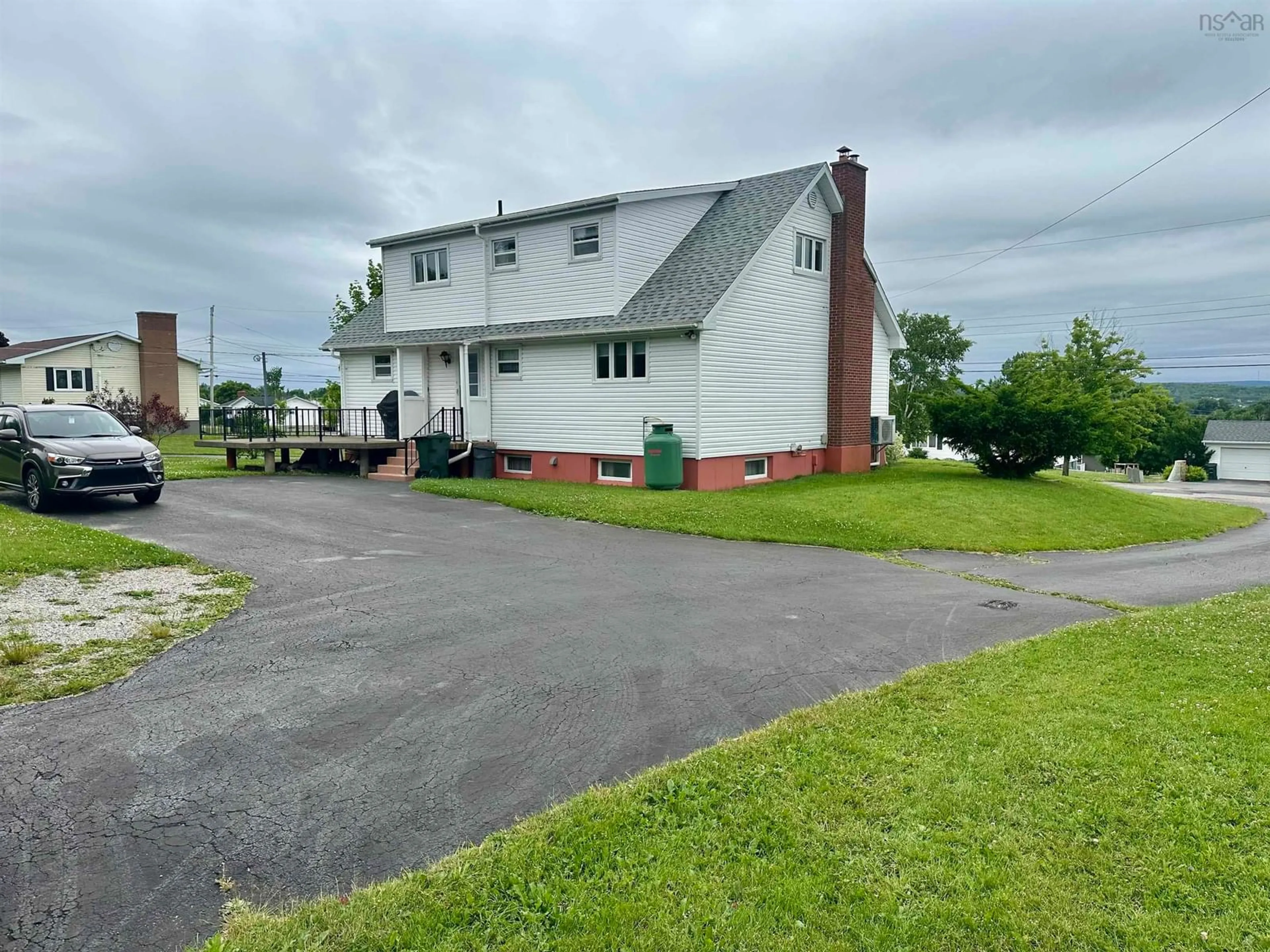 A pic from outside/outdoor area/front of a property/back of a property/a pic from drone, street for 51 Rendell Dr, Little Bras D'Or Nova Scotia B1Y 2Y7
