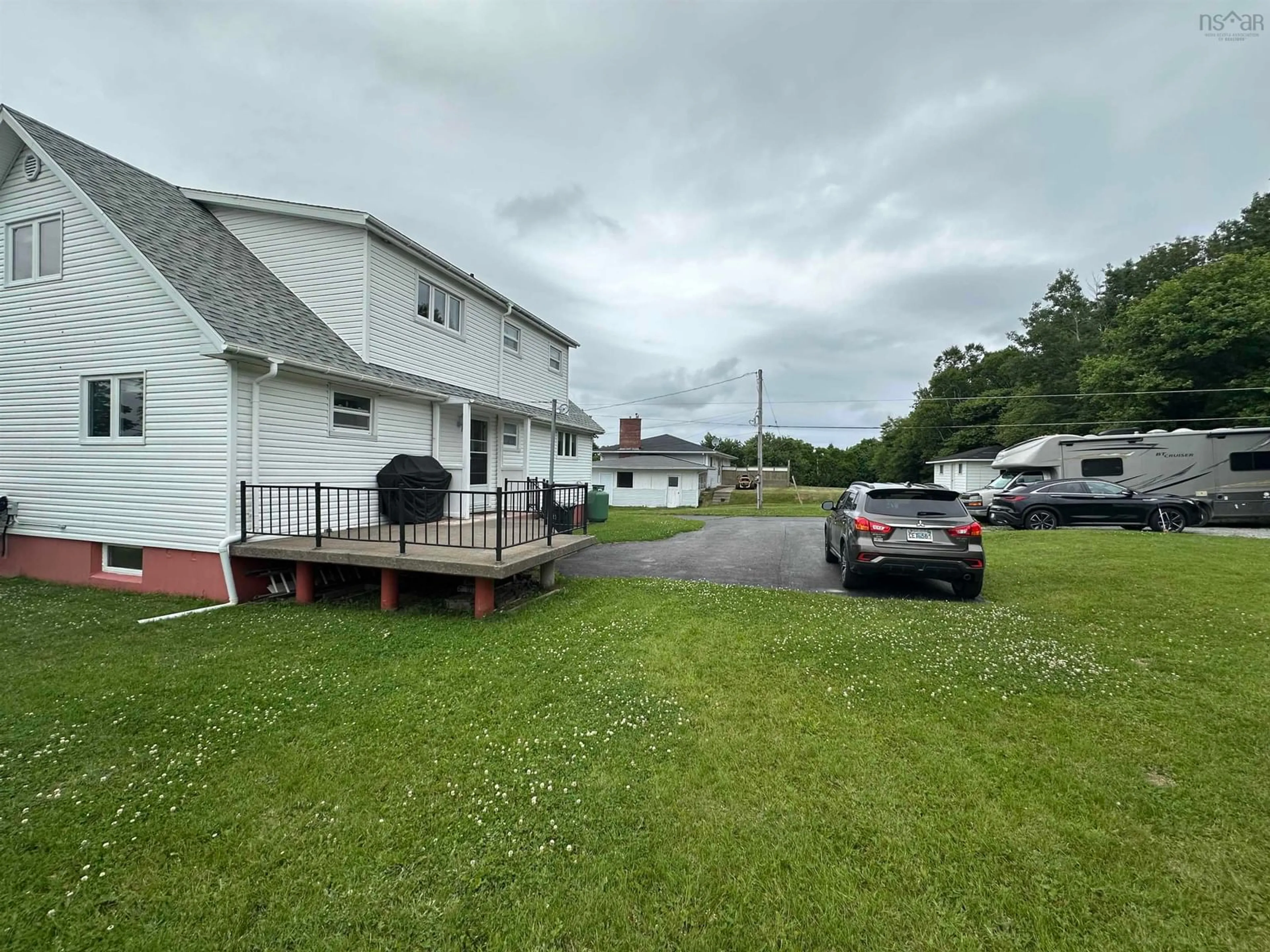 A pic from outside/outdoor area/front of a property/back of a property/a pic from drone, unknown for 51 Rendell Dr, Little Bras D'Or Nova Scotia B1Y 2Y7