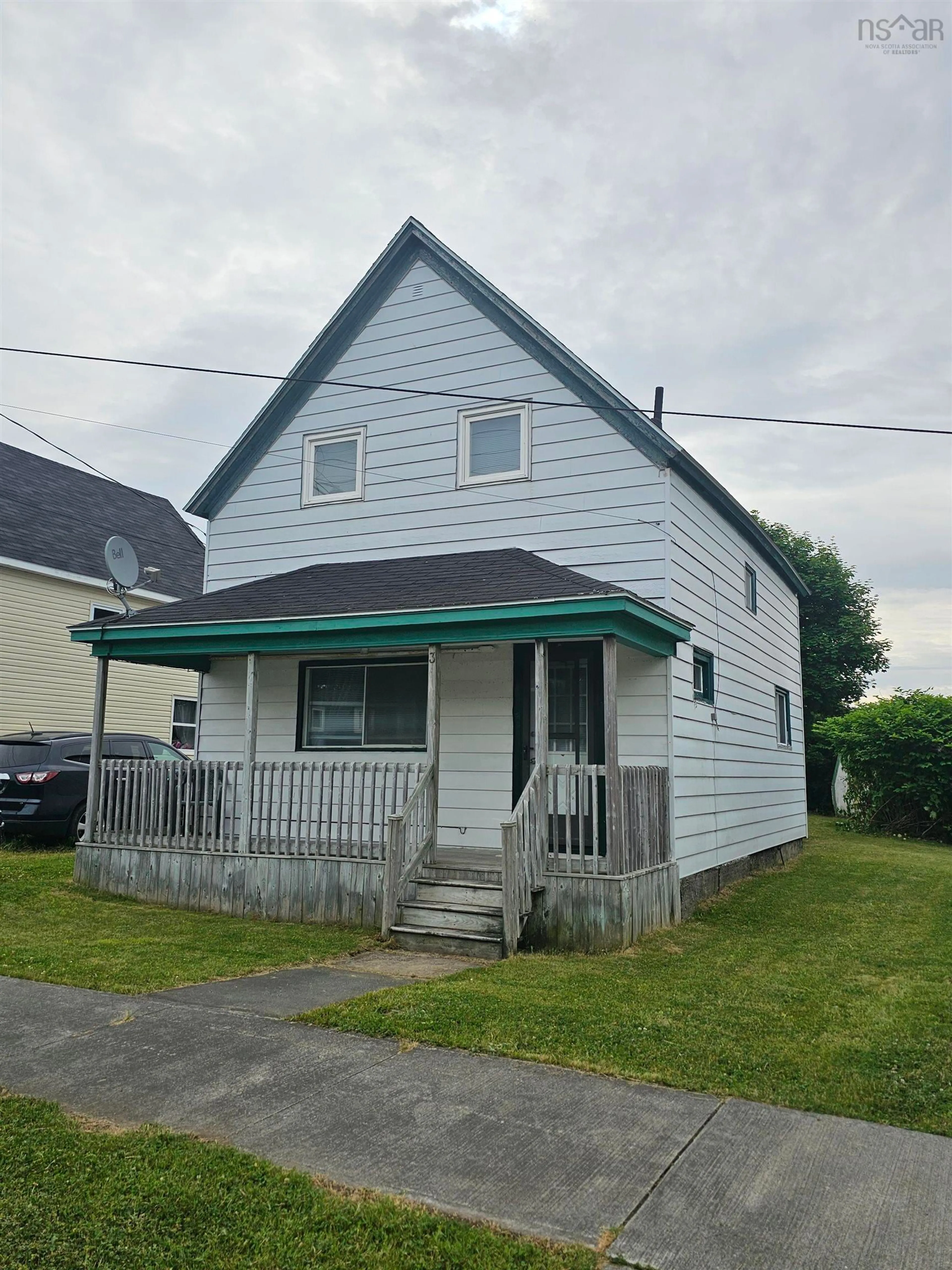 Home with vinyl exterior material, street for 3 Thompson Ave, North Sydney Nova Scotia B2A 1X7