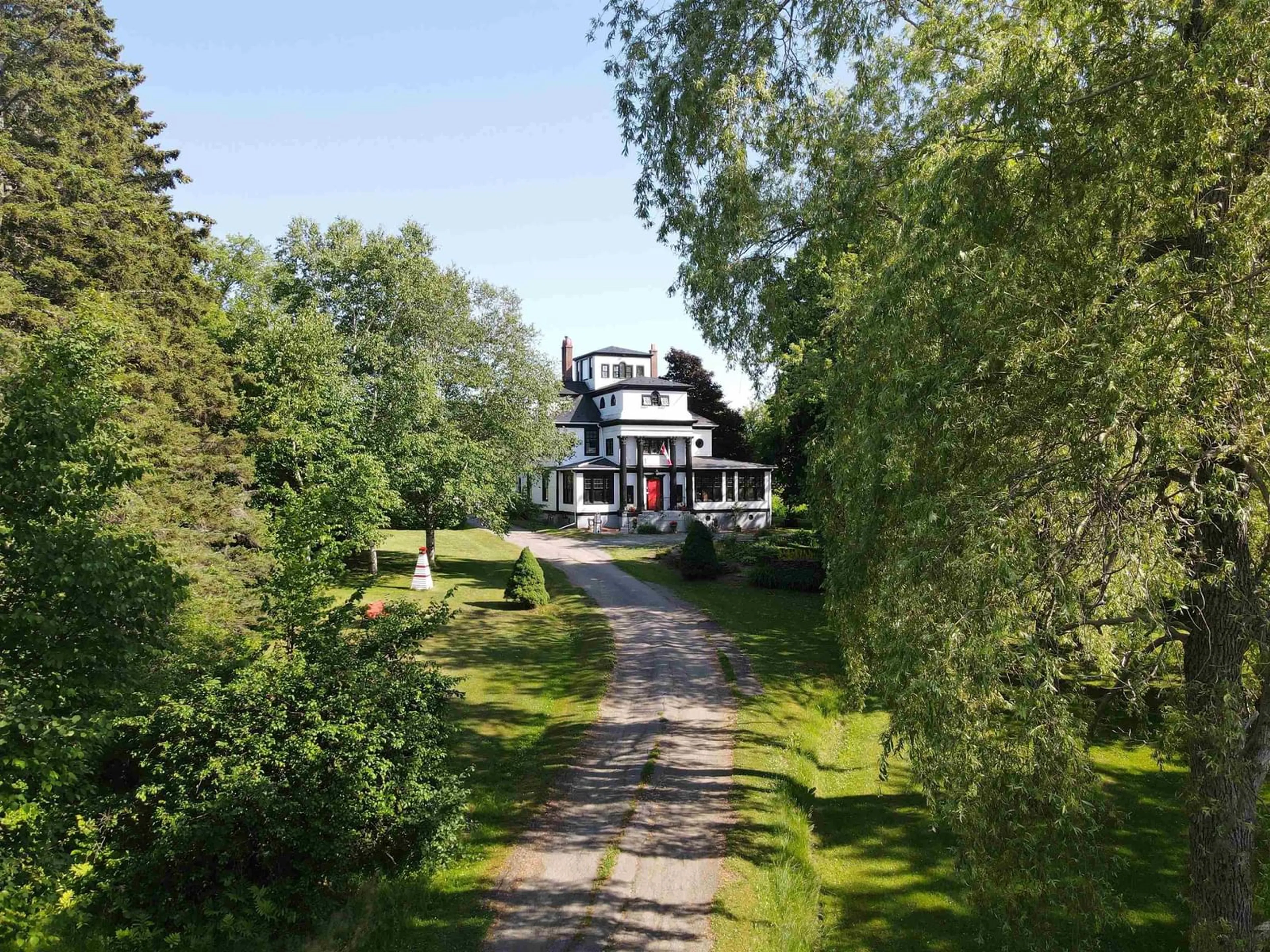 A pic from outside/outdoor area/front of a property/back of a property/a pic from drone, street for 317 Church Rd, Little Bras D'Or Nova Scotia B0E 3A3