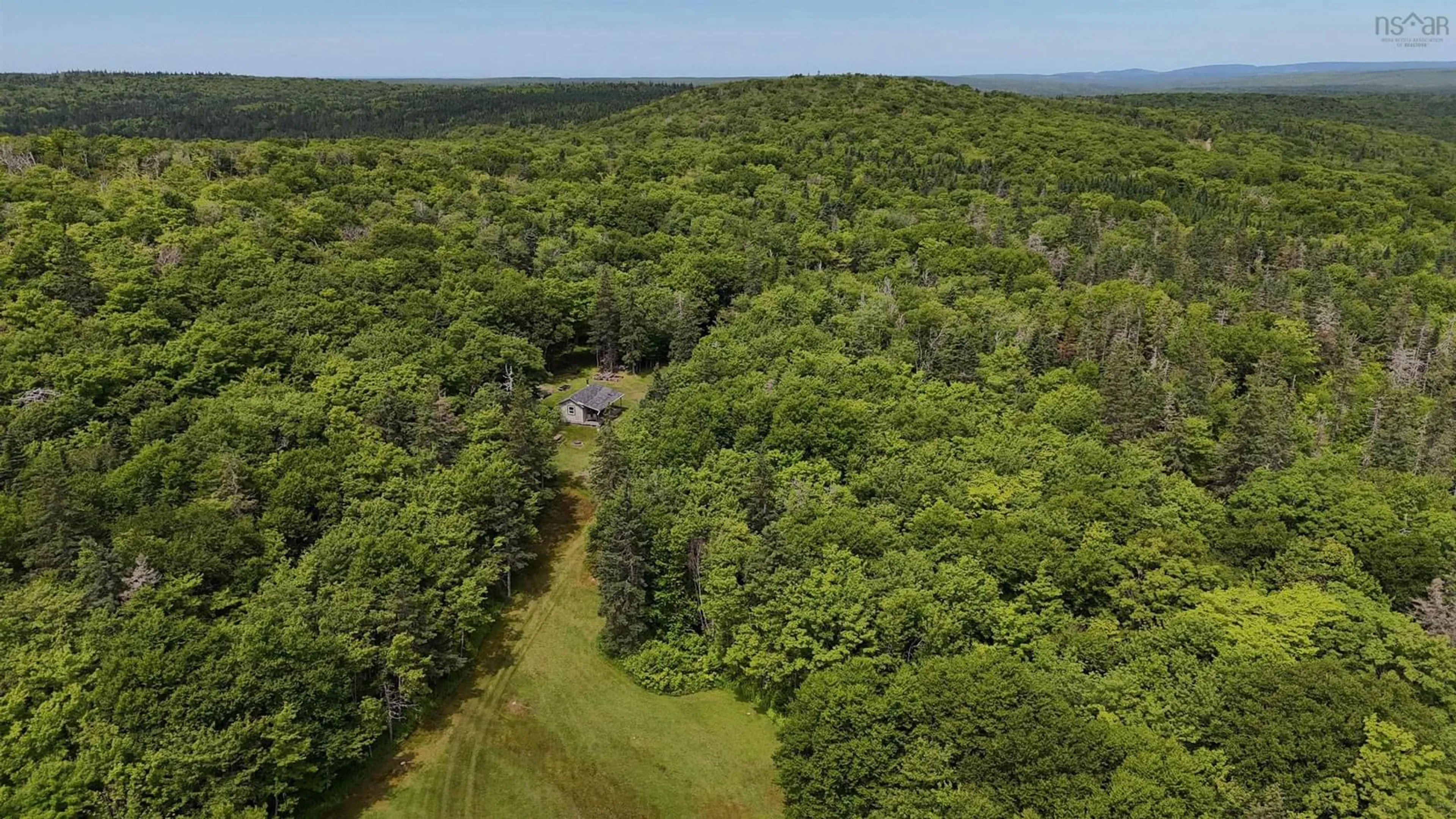 A pic from outside/outdoor area/front of a property/back of a property/a pic from drone, forest/trees view for 811 River Denys Mountain Rd, Glendale Nova Scotia B0E 2Y0