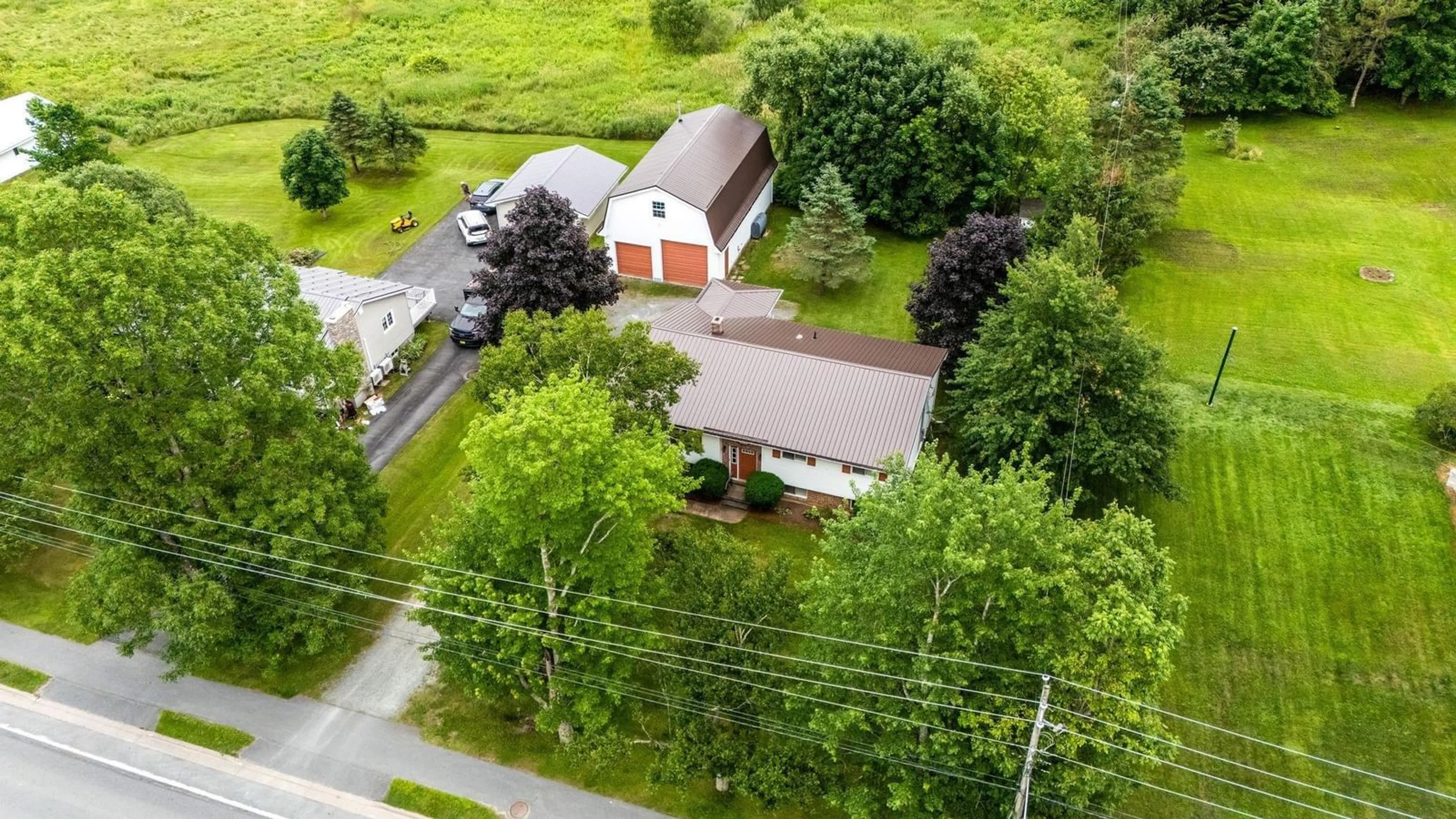A pic from outside/outdoor area/front of a property/back of a property/a pic from drone, street for 2163 Highway 2, Milford Nova Scotia B0N 1Y0