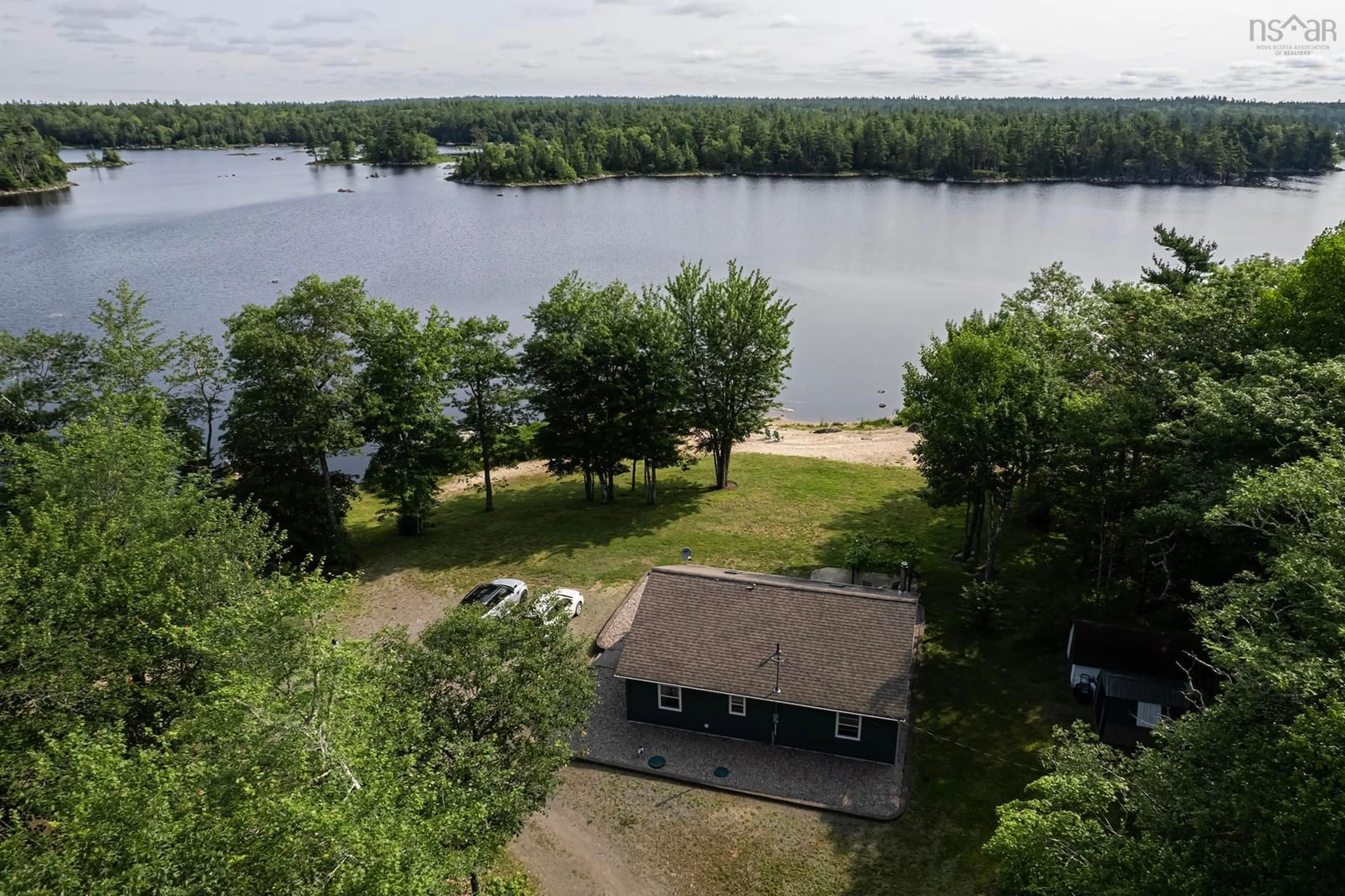 A pic from outside/outdoor area/front of a property/back of a property/a pic from drone, water/lake/river/ocean view for 4464 Old Liverpool Rd, Big Molly Upsim Lake Nova Scotia B0S 1P0