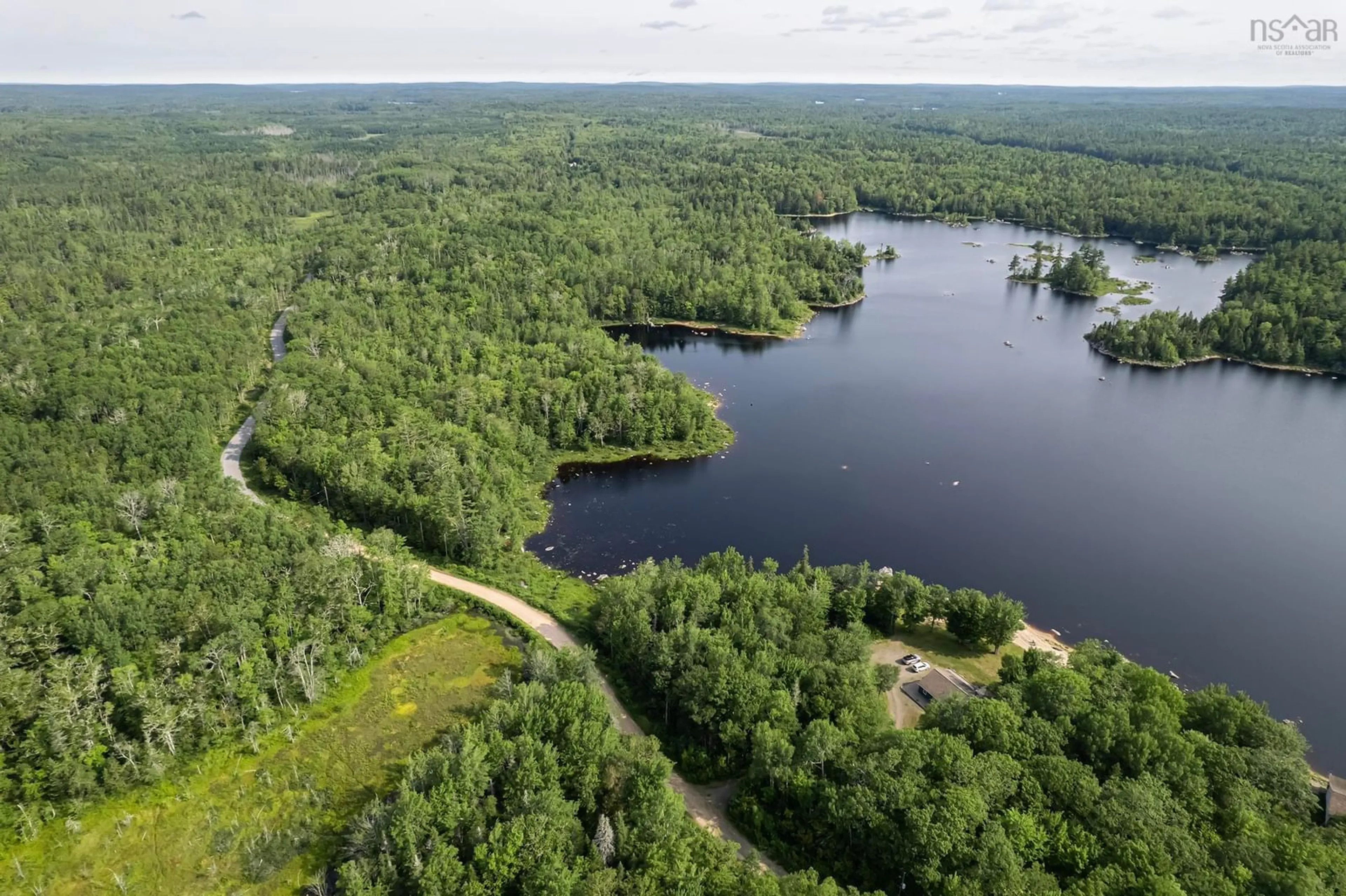 A pic from outside/outdoor area/front of a property/back of a property/a pic from drone, water/lake/river/ocean view for 4464 Old Liverpool Rd, Big Molly Upsim Lake Nova Scotia B0S 1P0