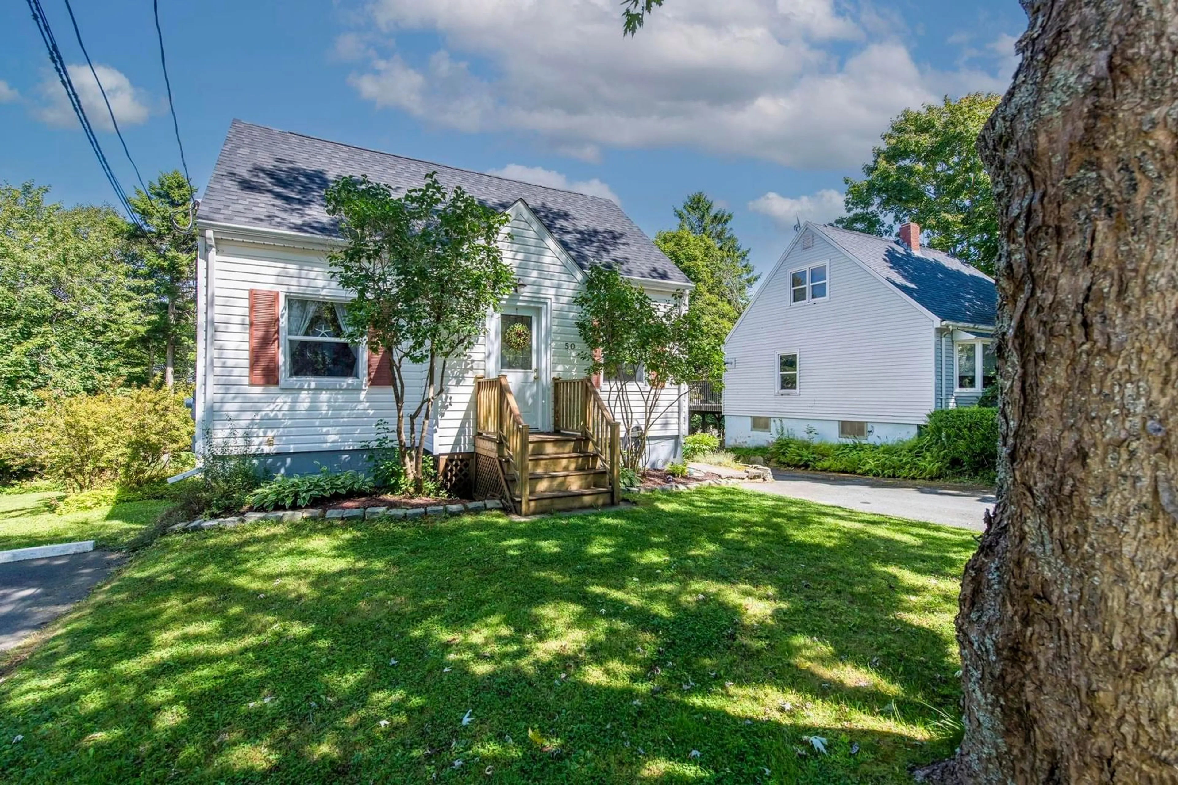 A pic from outside/outdoor area/front of a property/back of a property/a pic from drone, street for 50 Fenwood Rd, Halifax Nova Scotia B3N 1G8