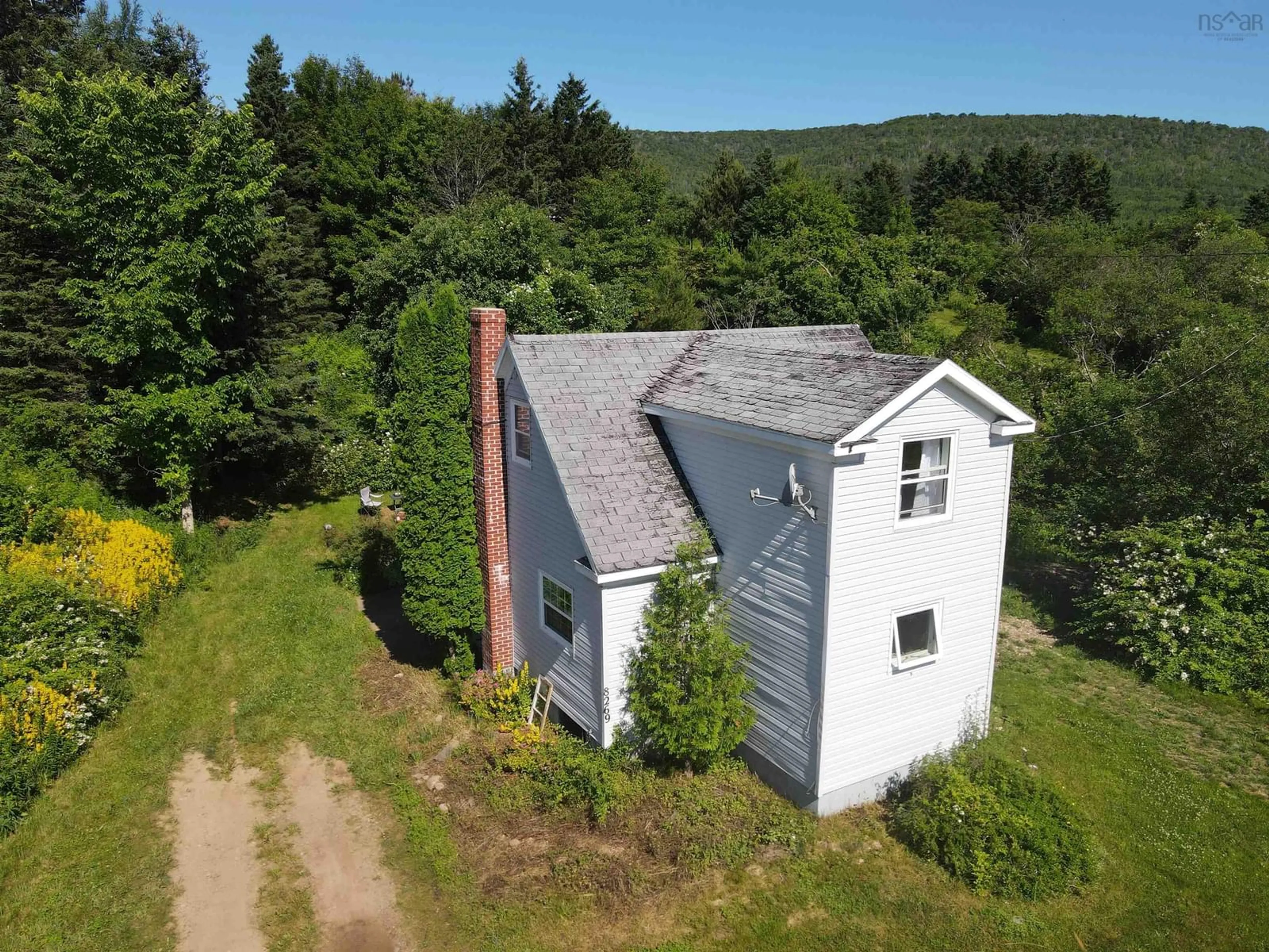 A pic from outside/outdoor area/front of a property/back of a property/a pic from drone, building for 8269 Cabot Trail, Margaree Forks Nova Scotia B0E 2A0