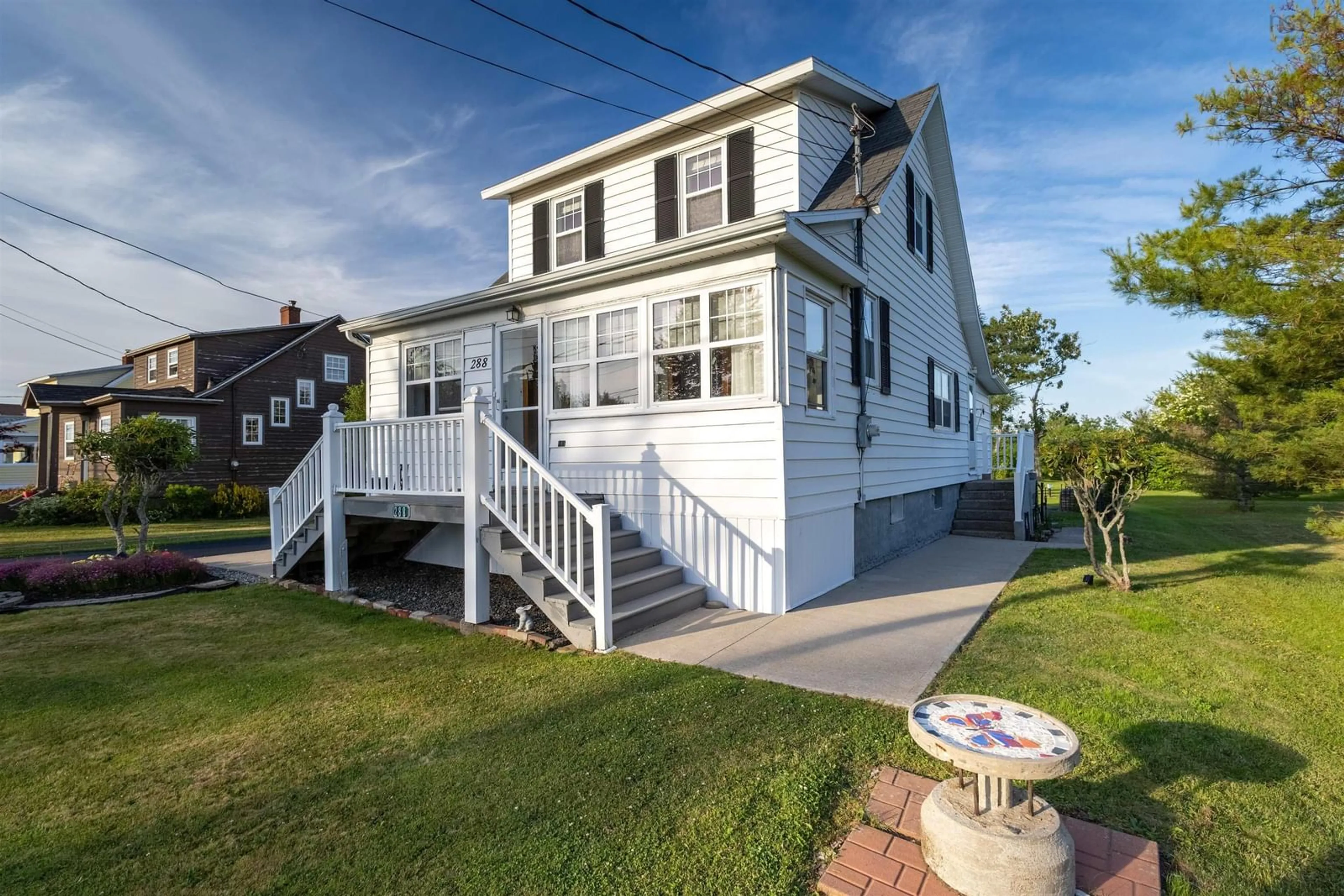 Home with vinyl exterior material, street for 288 Atlantic St, Sydney Mines Nova Scotia B1V 1W8