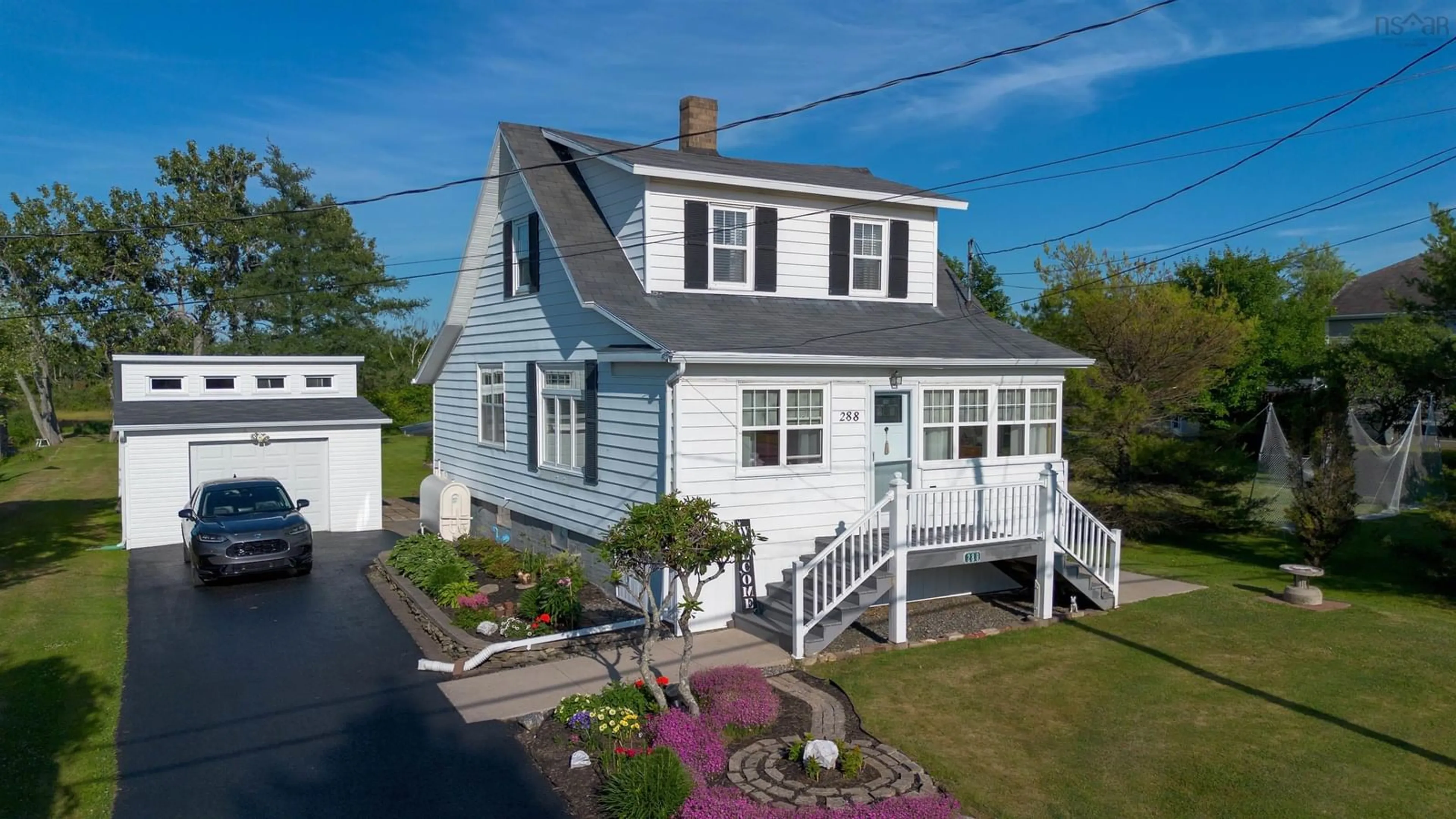 Home with vinyl exterior material, street for 288 Atlantic St, Sydney Mines Nova Scotia B1V 1W8
