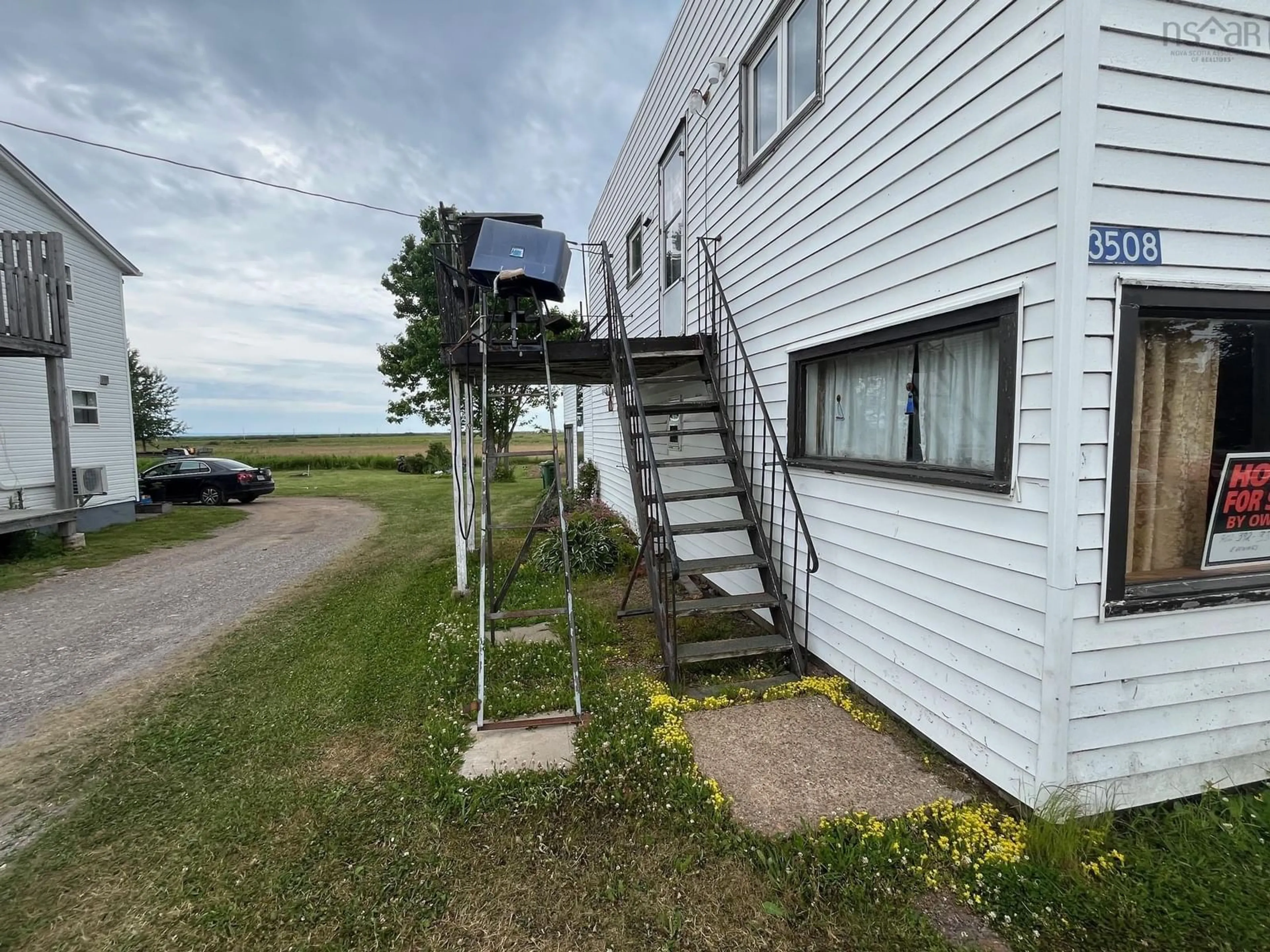 A pic from outside/outdoor area/front of a property/back of a property/a pic from drone, water/lake/river/ocean view for 3508 Highway 209, Advocate Harbour Nova Scotia B0M 1A0