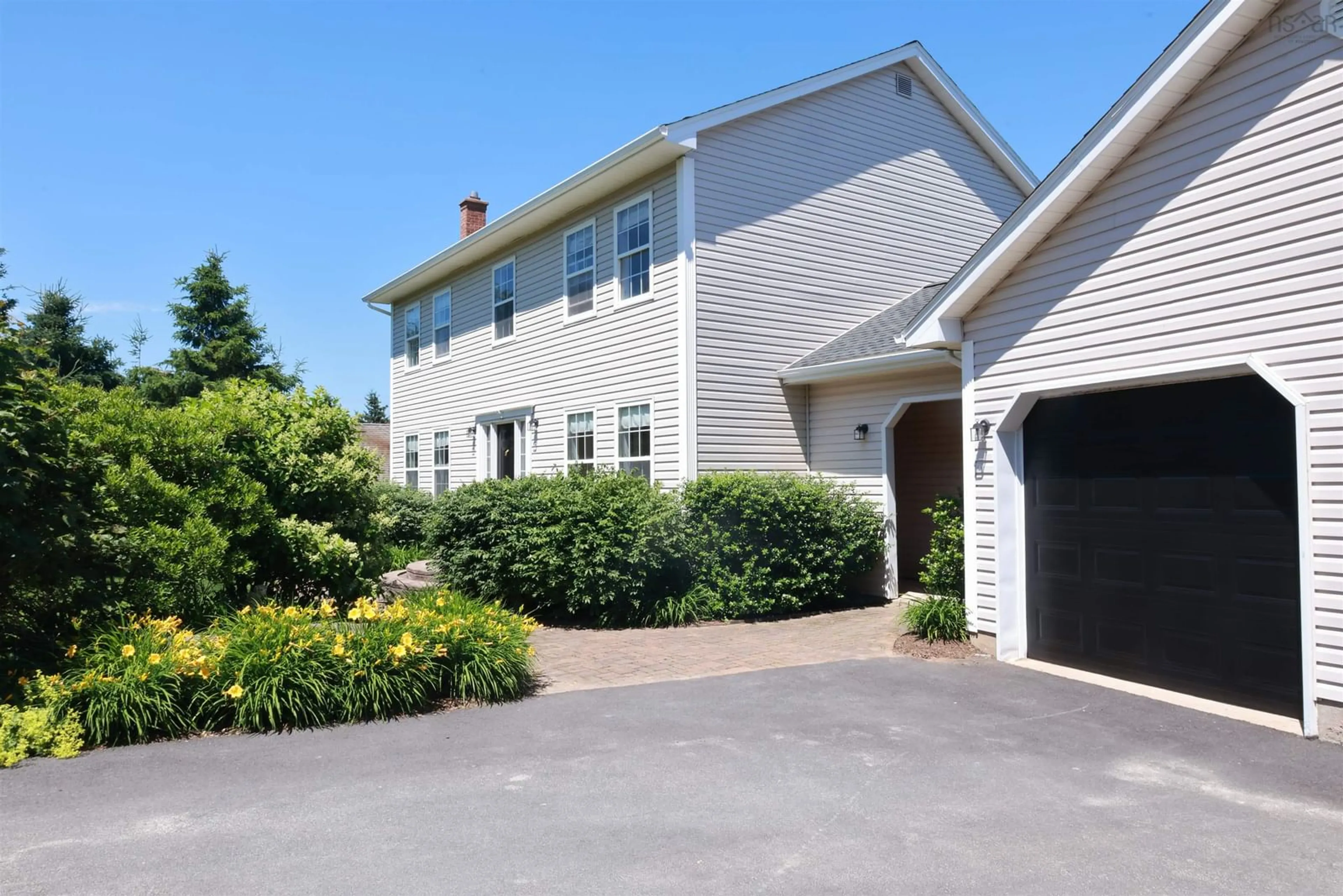 Home with vinyl exterior material, street for 1939 Cow Bay Rd, Cow Bay Nova Scotia B3G 1K6