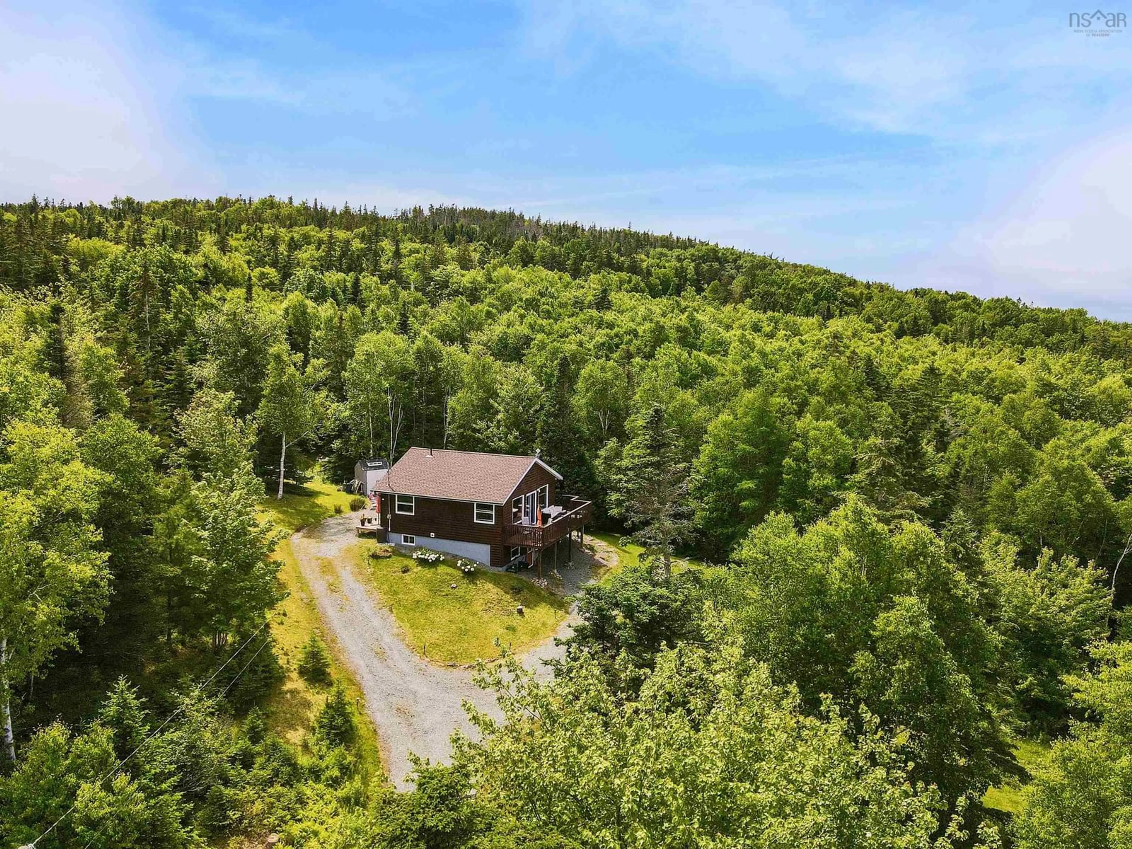 A pic from outside/outdoor area/front of a property/back of a property/a pic from drone, forest/trees view for 51 Nature Dream Blvd, Roberta Nova Scotia B0E 3K0