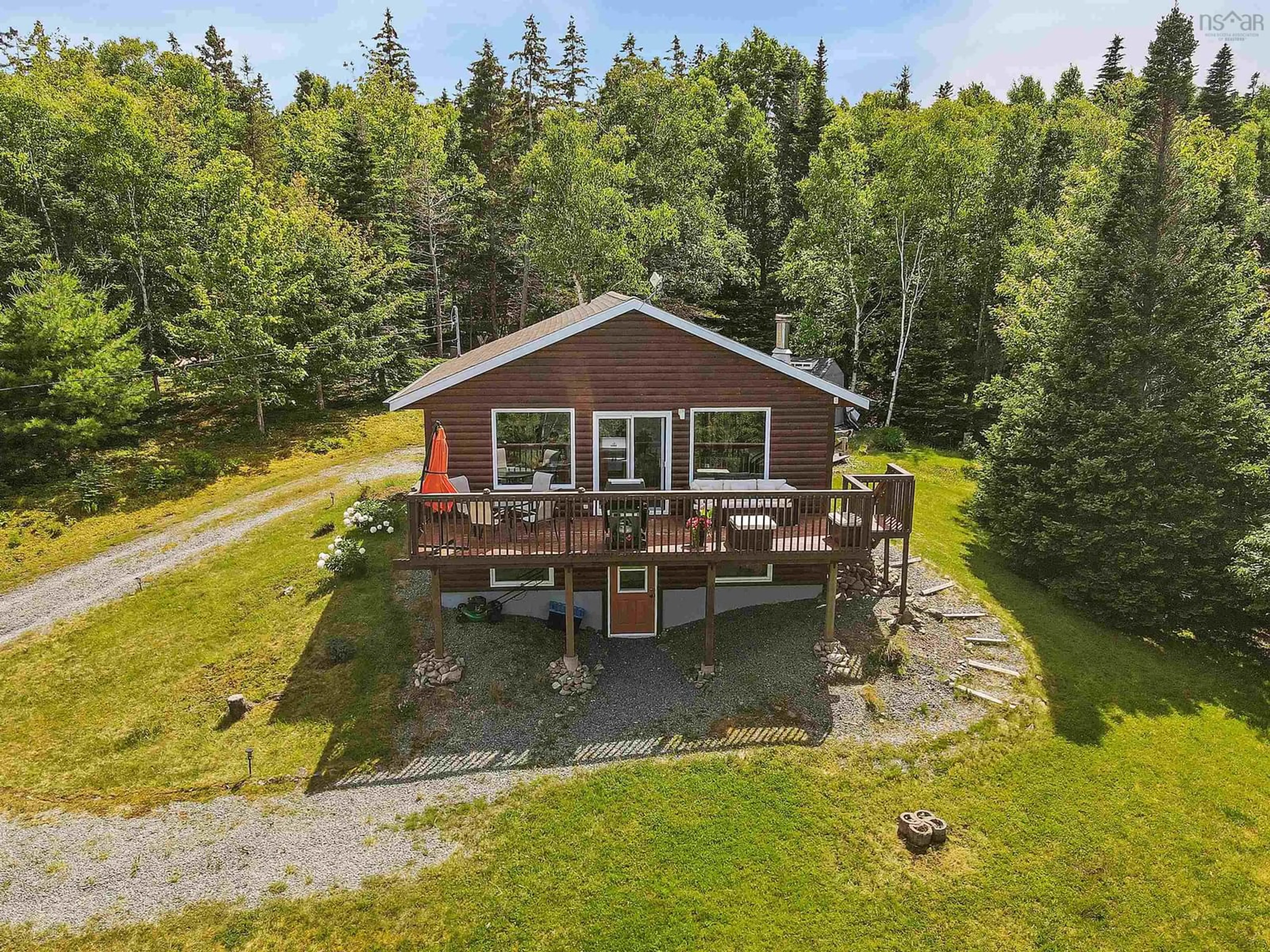 A pic from outside/outdoor area/front of a property/back of a property/a pic from drone, water/lake/river/ocean view for 51 Nature Dream Blvd, Roberta Nova Scotia B0E 3K0