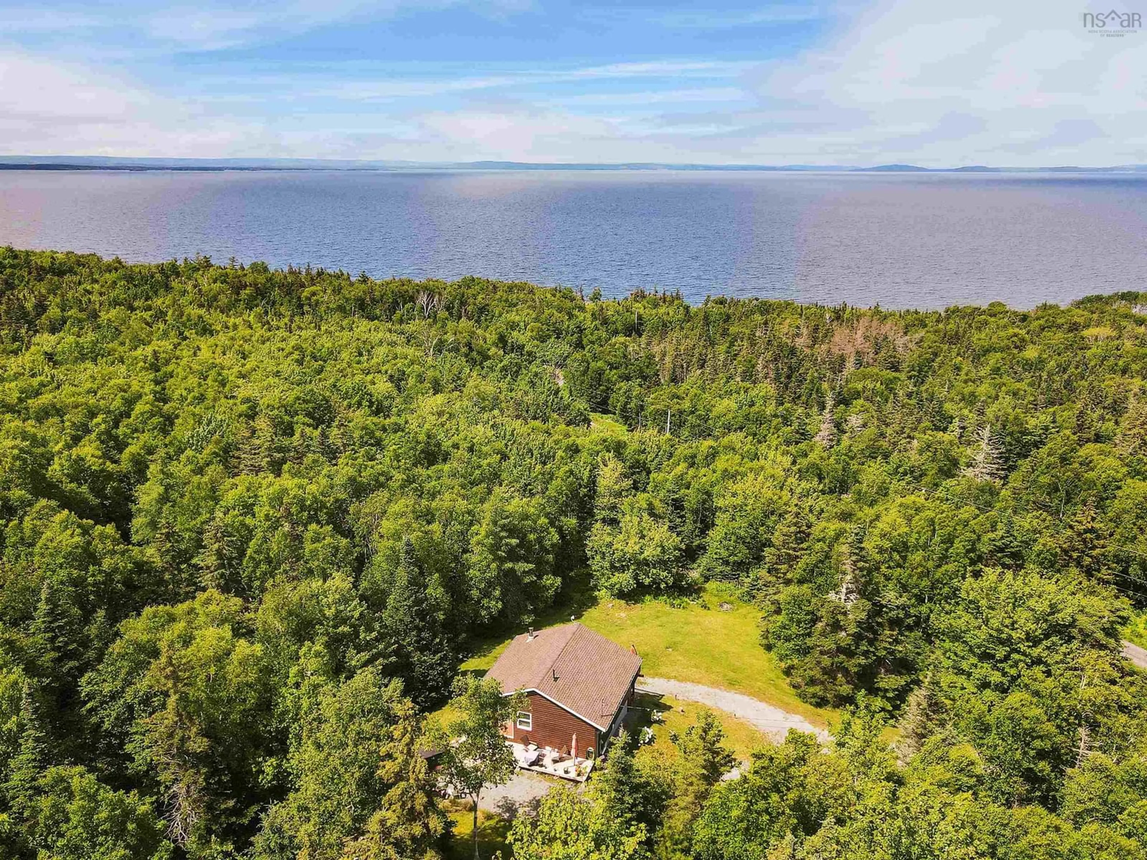 A pic from outside/outdoor area/front of a property/back of a property/a pic from drone, water/lake/river/ocean view for 51 Nature Dream Blvd, Roberta Nova Scotia B0E 3K0