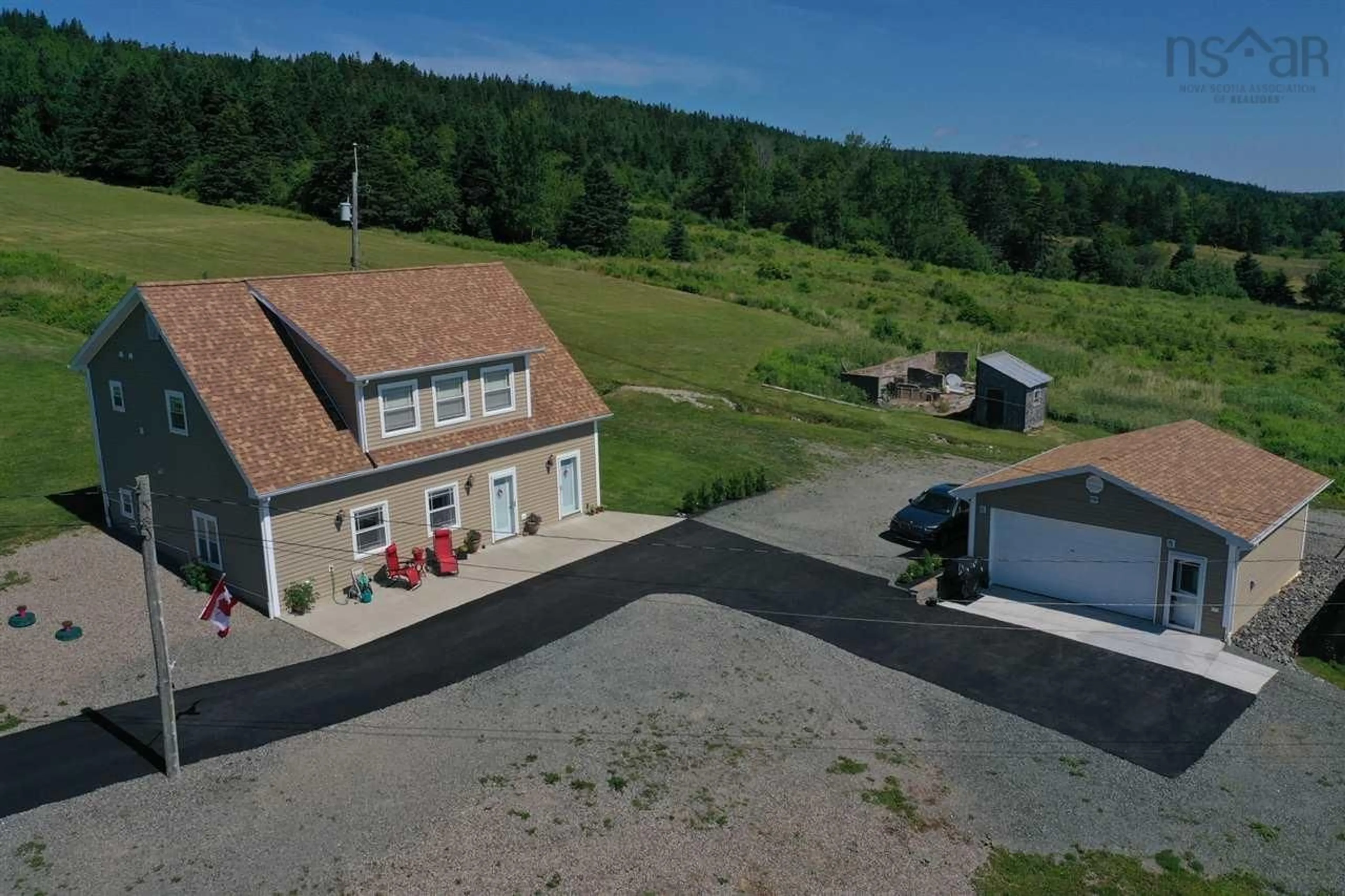 A pic from outside/outdoor area/front of a property/back of a property/a pic from drone, unknown for 1042 Coxheath Rd, Coxheath Nova Scotia B1L 1B2